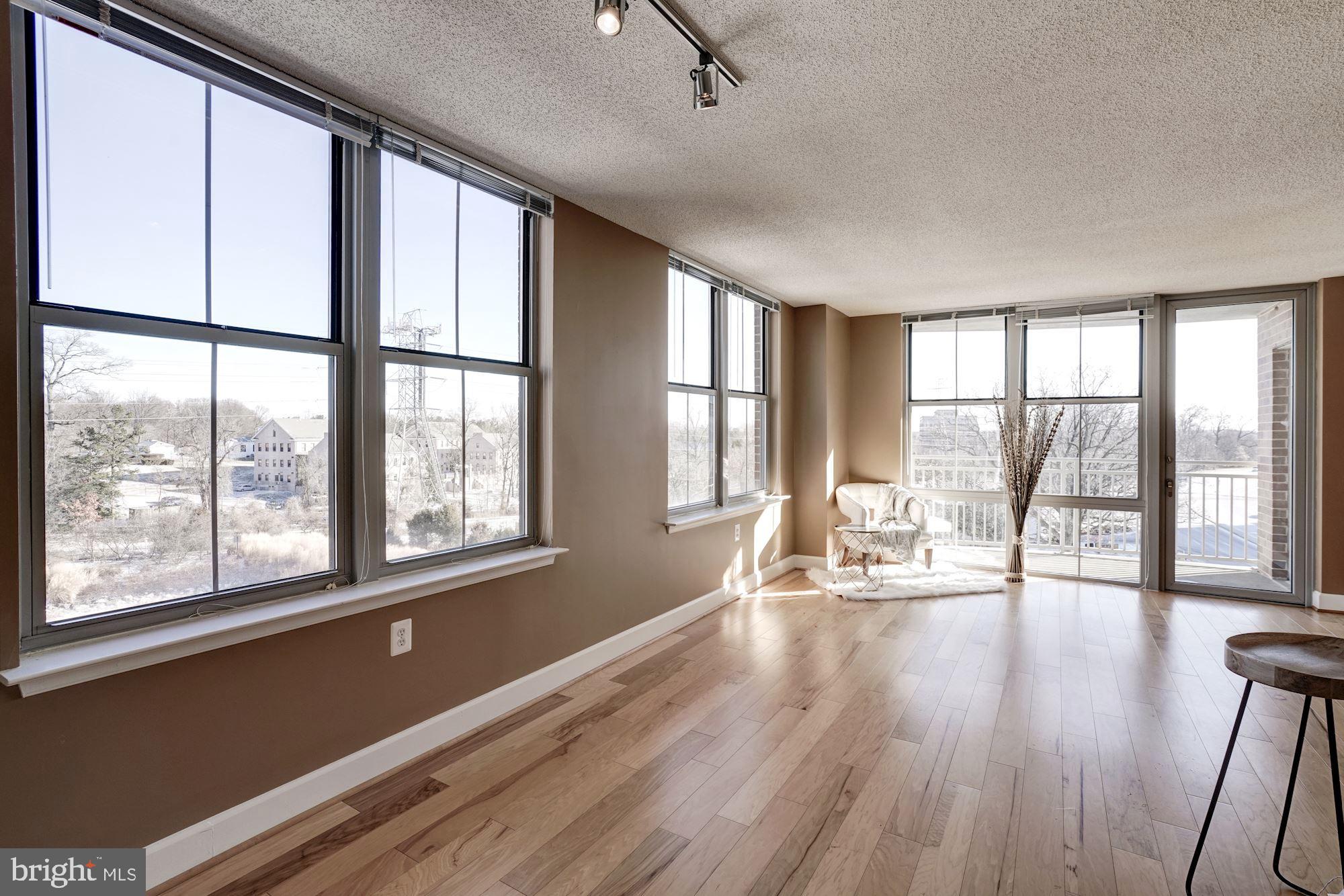 11800 Sunset Hills Road, Unit 422 Reston, VA 20190 - Photo 2 of 36 Light filled corner unit