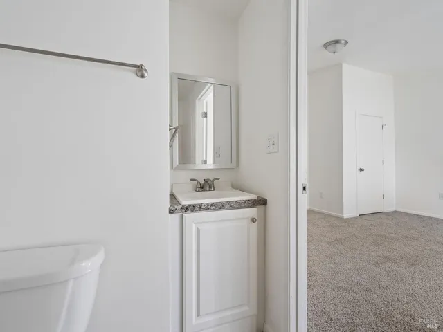a view of storage and utility room with washer and dryer