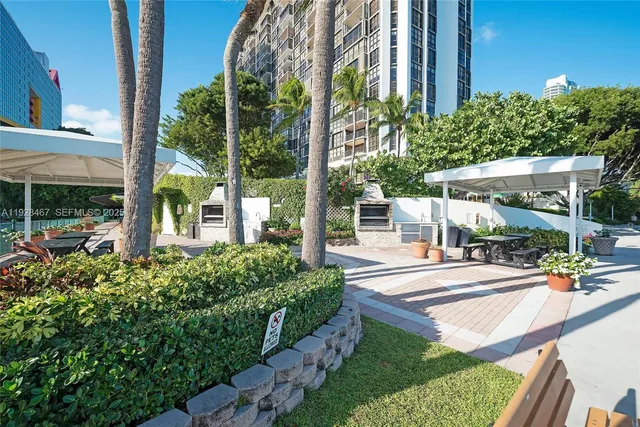 front view of a building with a garden