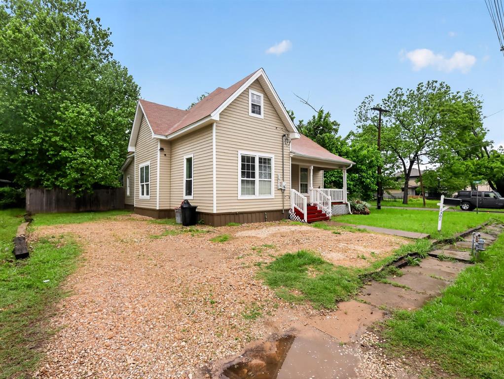 1301 Locust Street Commerce, TX 75428 - Photo 12 of 17 a view of outdoor space yard and front view of a house