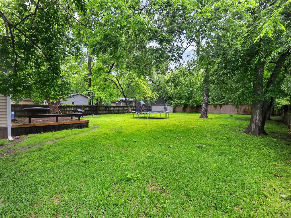 1301 Locust Street Commerce, TX 75428 - Photo 15 of 17 a view of a park with large trees