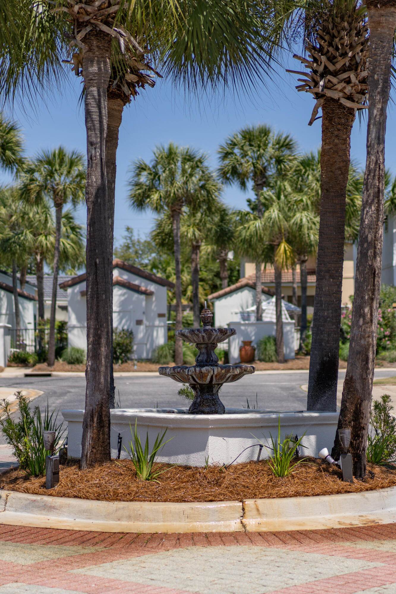 106 Tuscany Drive Destin, FL 32541 - Photo 31 of 41 a front view of a house with garden