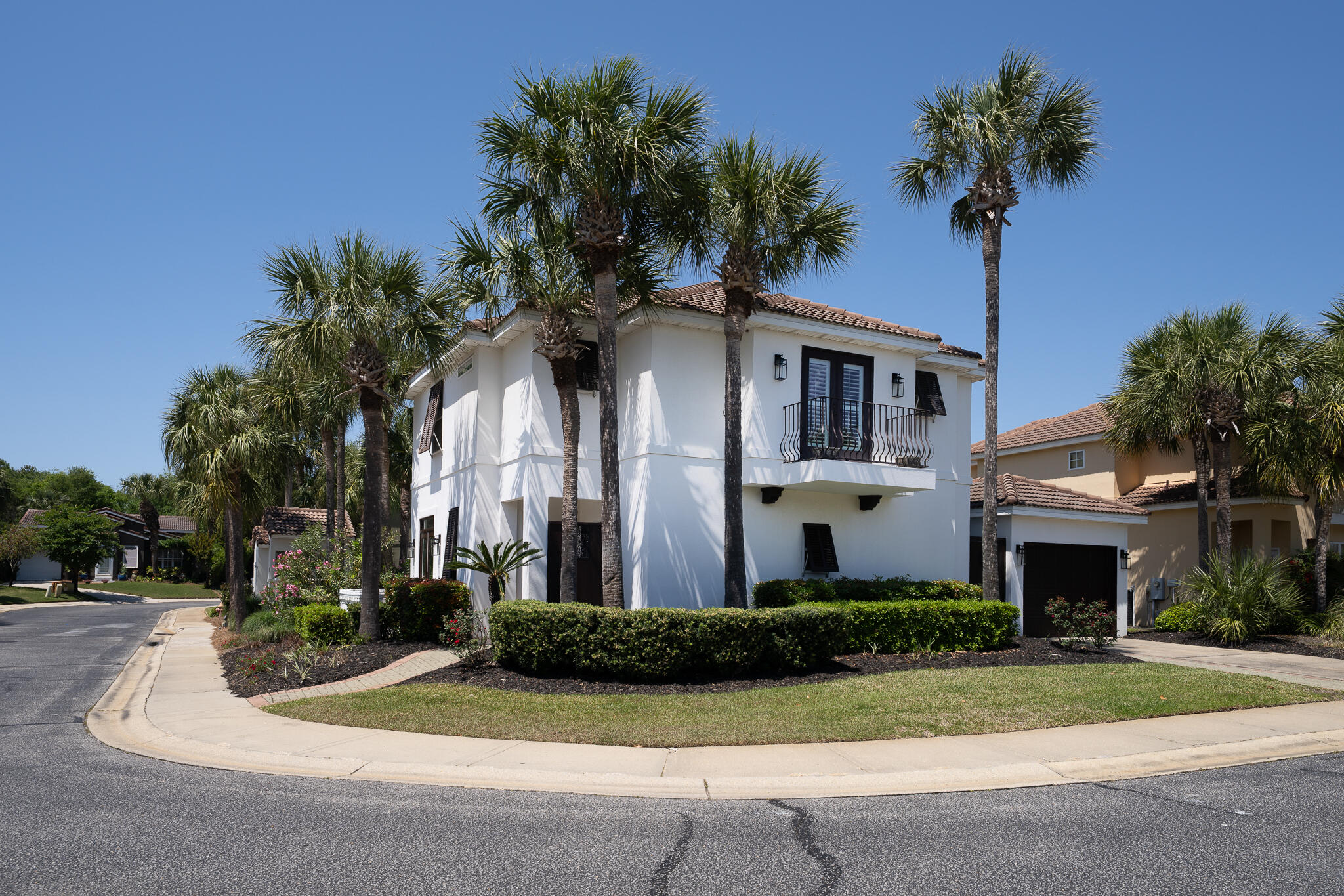 106 Tuscany Drive Destin, FL 32541 - Photo 38 of 41 a front view of a house with yard and garage