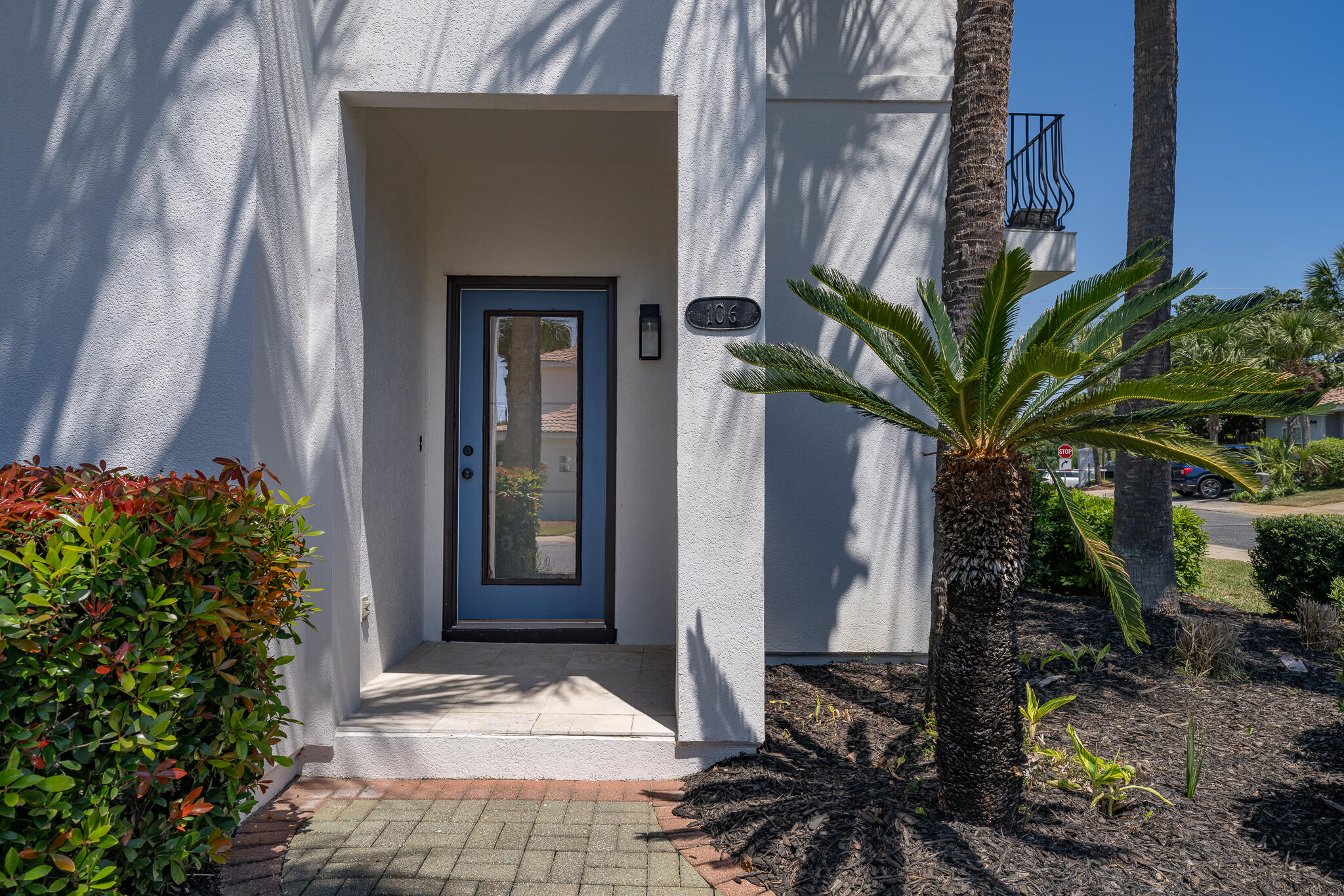 106 Tuscany Drive Destin, FL 32541 - Photo 4 of 41 a front view of a house with a yard