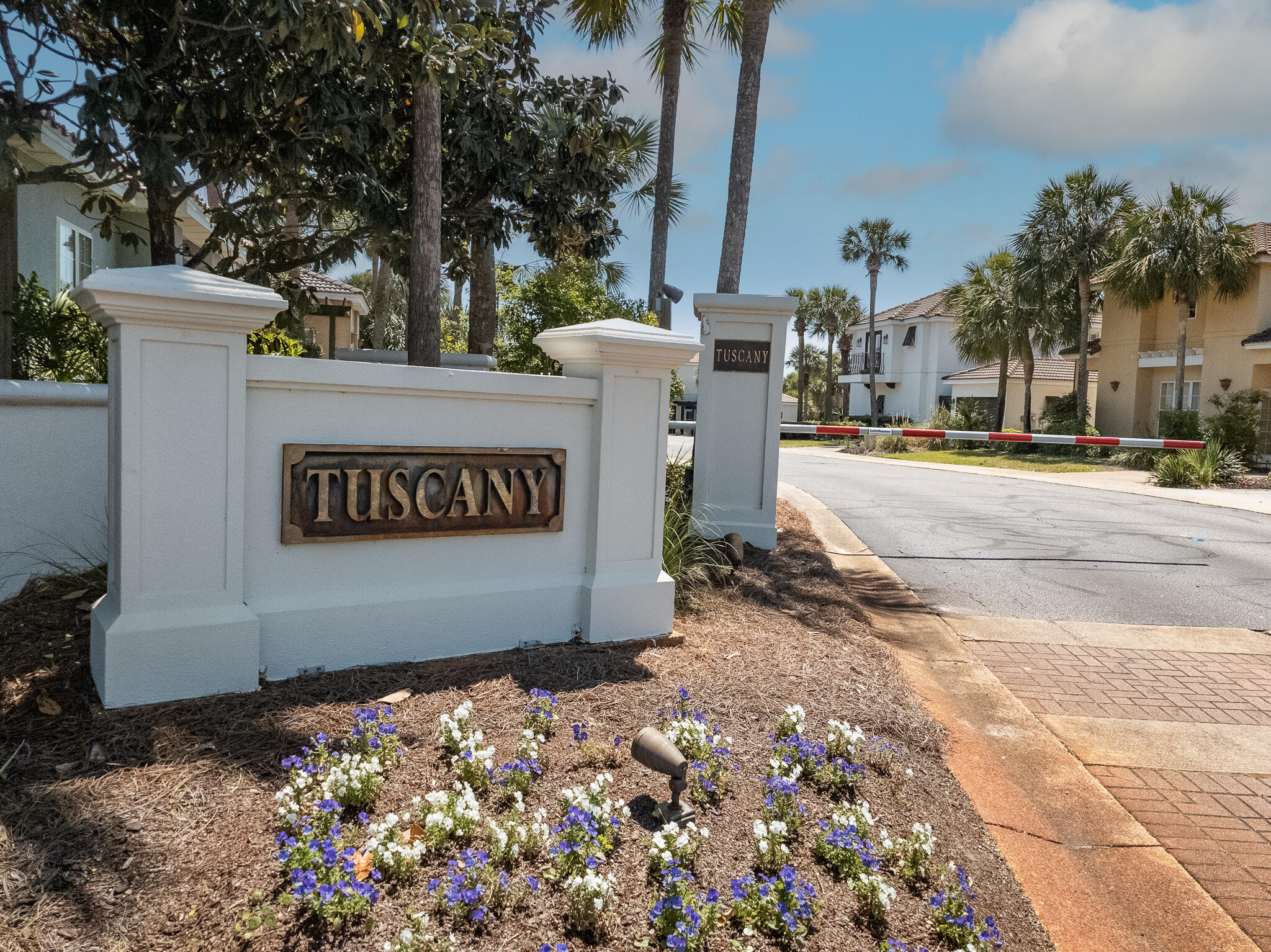 106 Tuscany Drive Destin, FL 32541 - Photo 41 of 41 a sign board with a parking space
