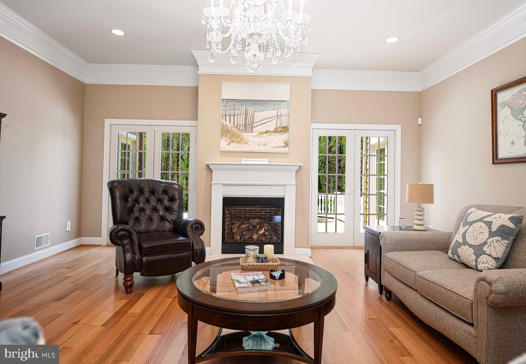 2874 Ady Road Forest Hill, MD 21050 - Photo 17 of 85 a living room with furniture a fireplace and a table