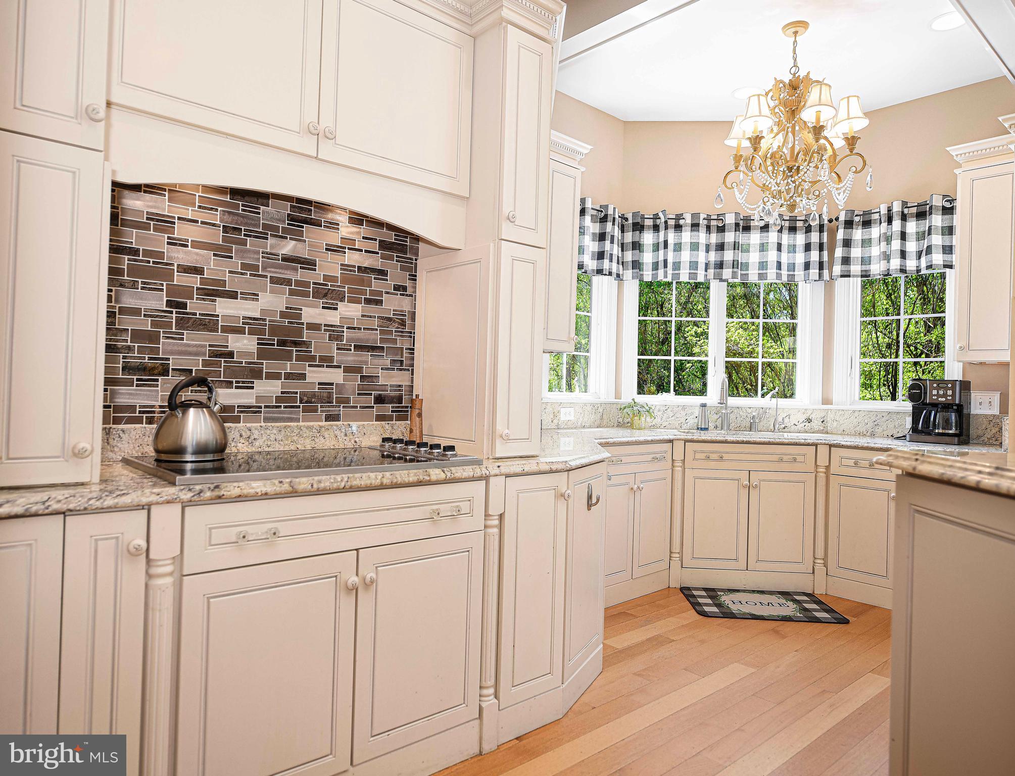 2874 Ady Road Forest Hill, MD 21050 - Photo 20 of 85 a kitchen with granite countertop white cabinets and a sink