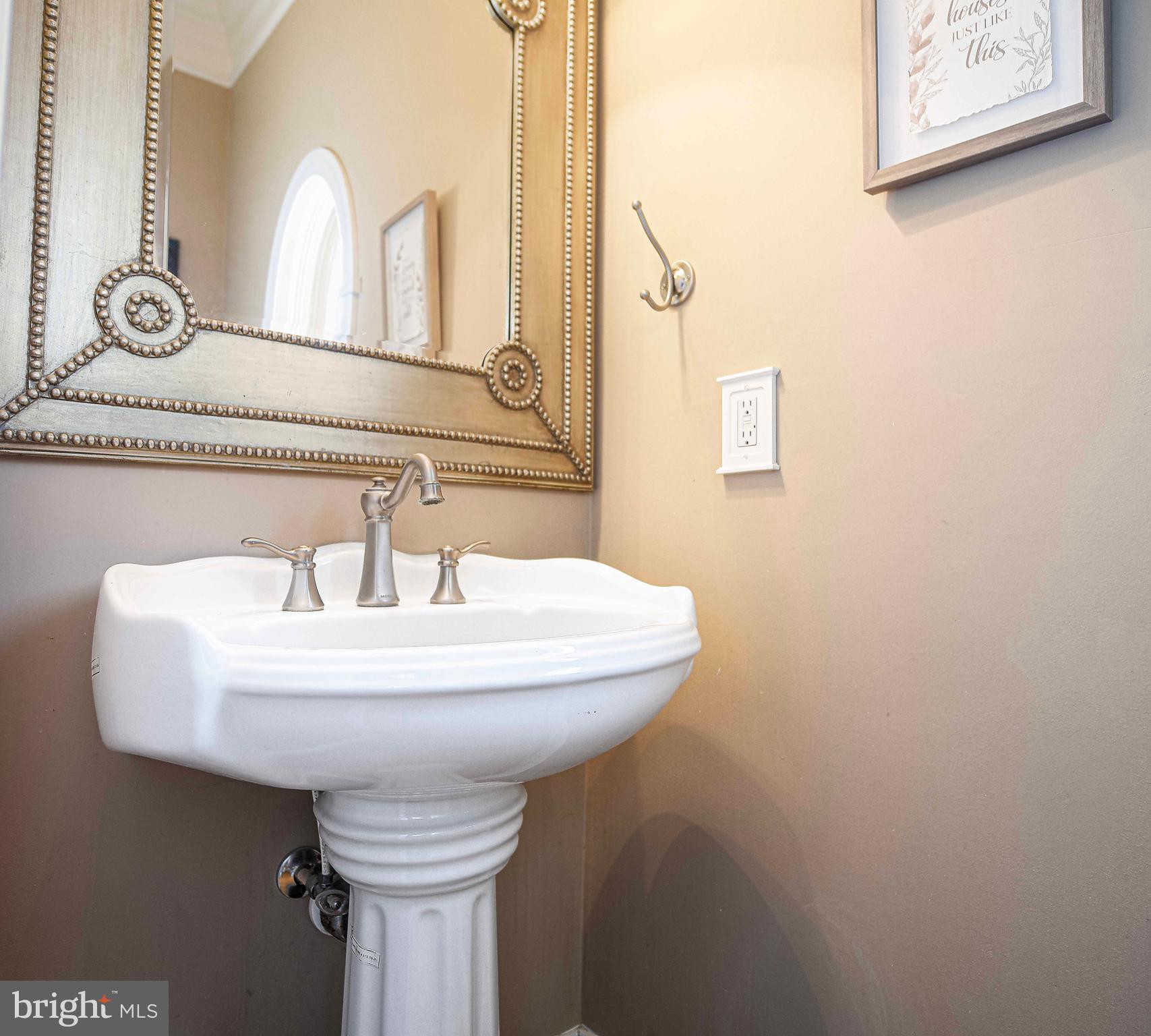 2874 Ady Road Forest Hill, MD 21050 - Photo 27 of 85 a bathroom with a sink a mirror and toilet