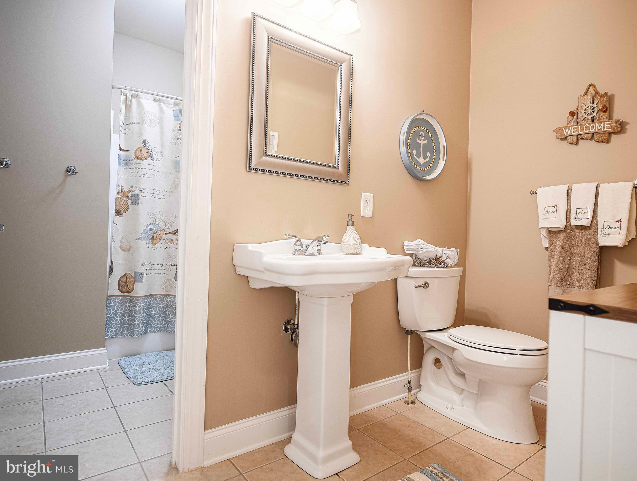 2874 Ady Road Forest Hill, MD 21050 - Photo 45 of 85 a bathroom with a sink toilet and a mirror