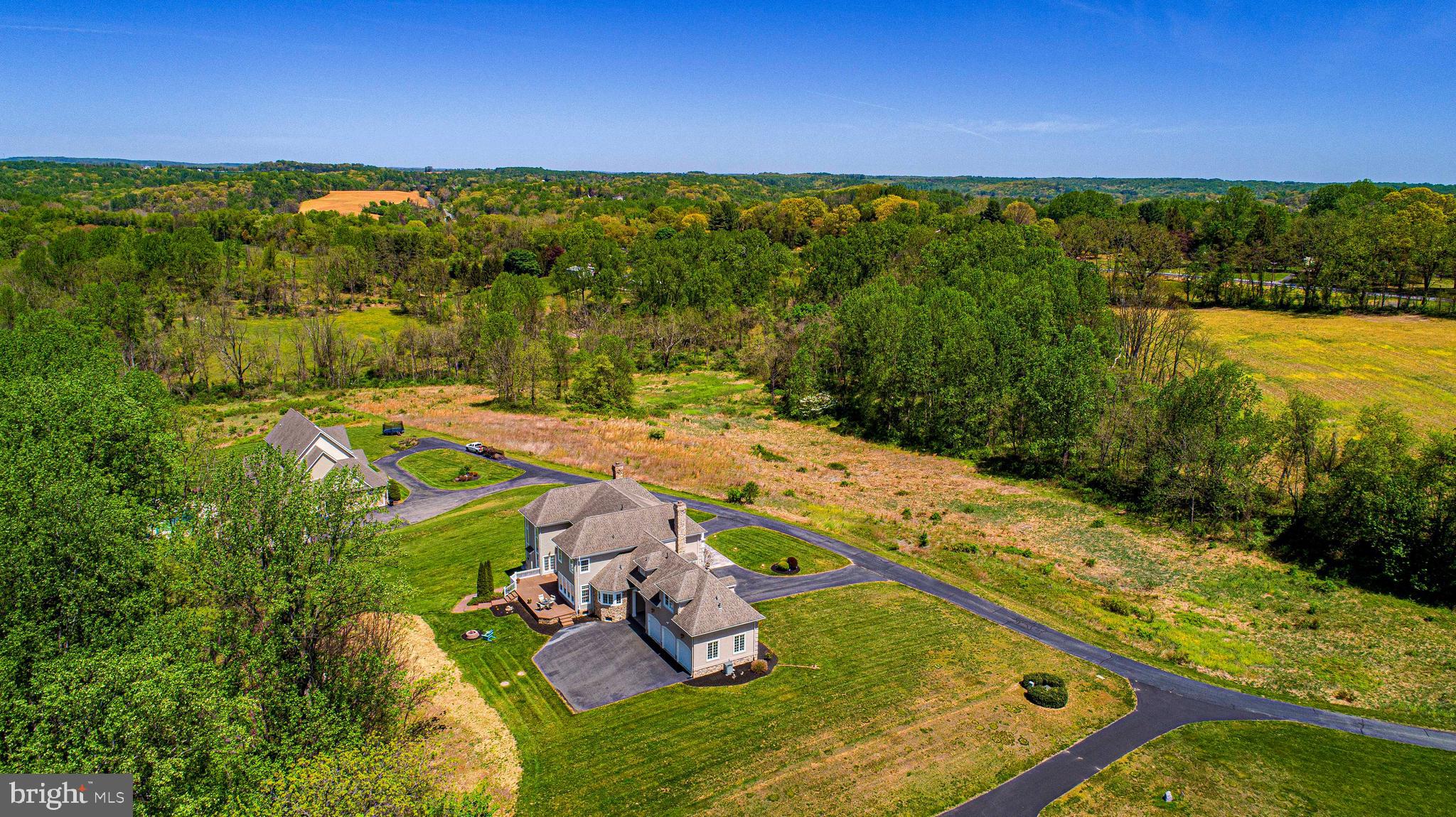 2874 Ady Road Forest Hill, MD 21050 - Photo 78 of 85 a view of a backyard with lawn chairs wooden floor and a ocean view