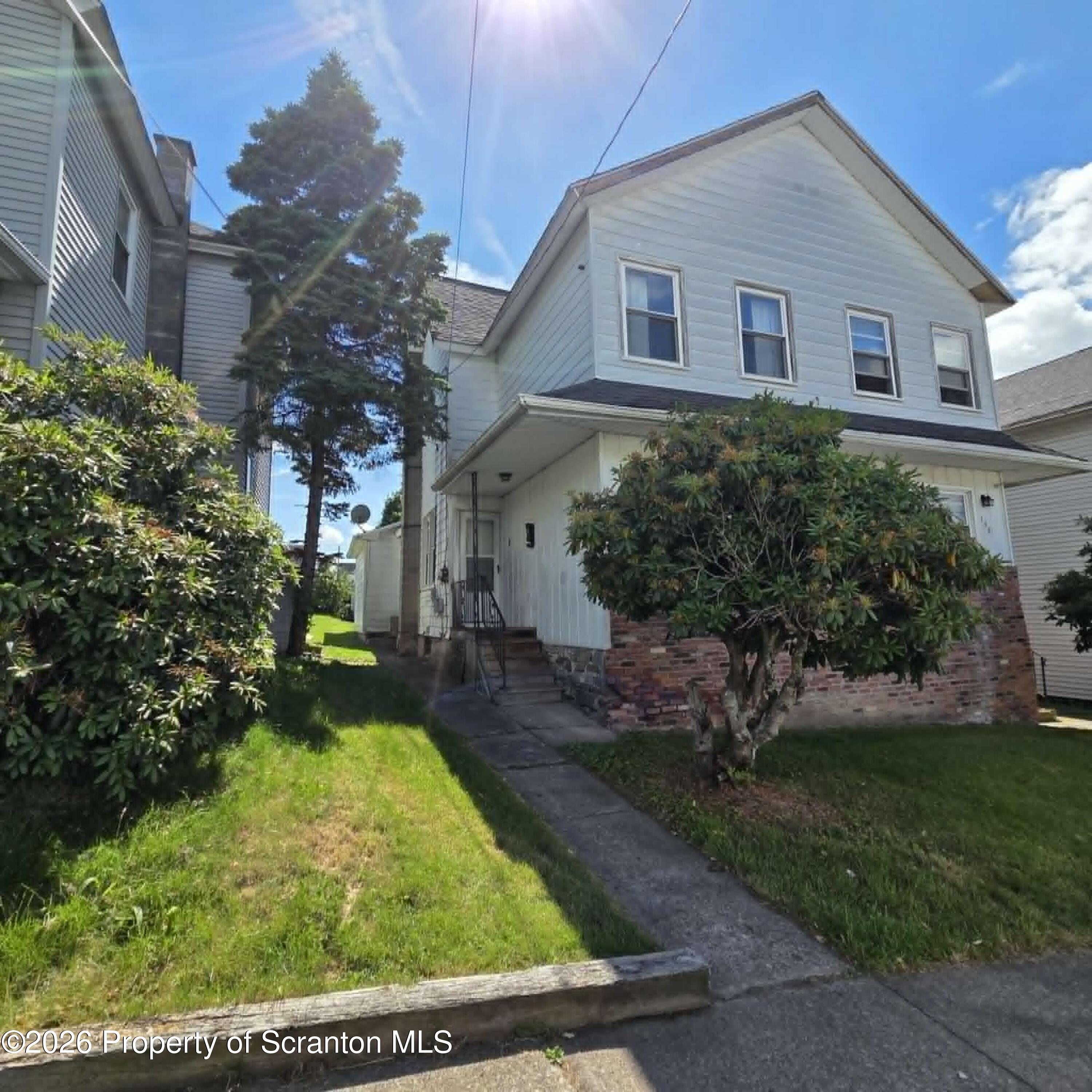 140 East Grove Street Taylor, PA 18517 - Photo 1 of 16 Front