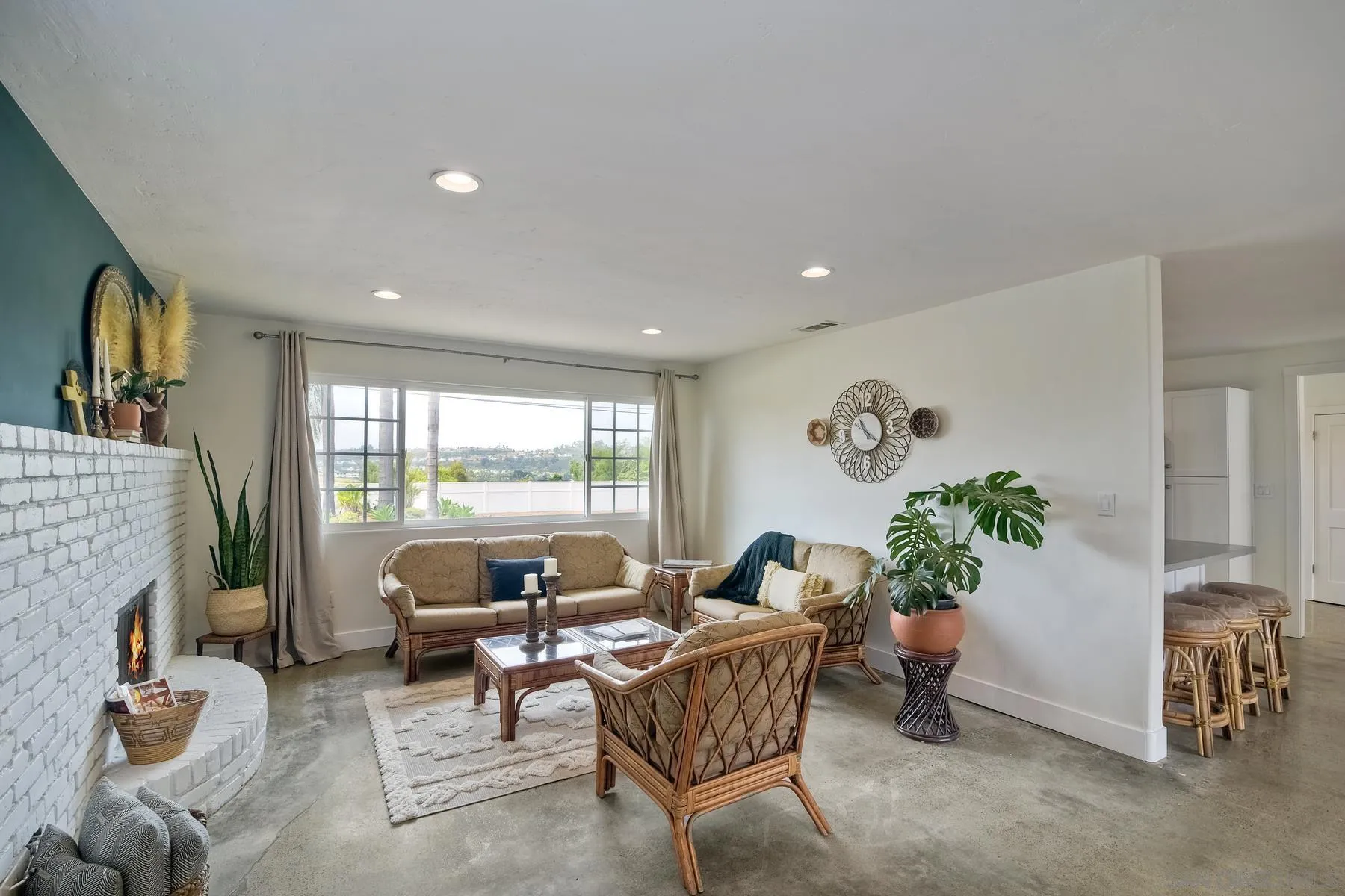 1451 Ridge Road Vista, CA 92081 - Photo 11 of 31 a living room with furniture and a floor to ceiling window
