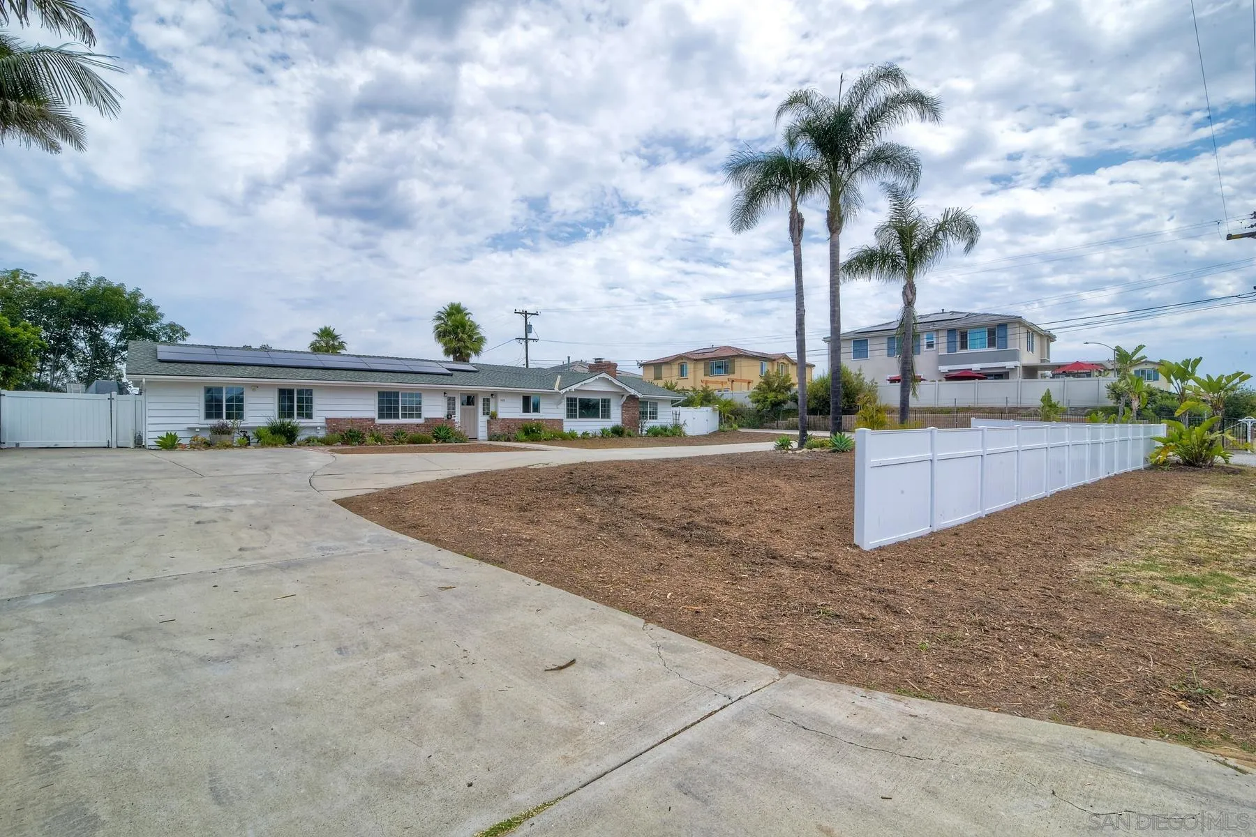 1451 Ridge Road Vista, CA 92081 - Photo 2 of 31 a view of multiple houses with a yard