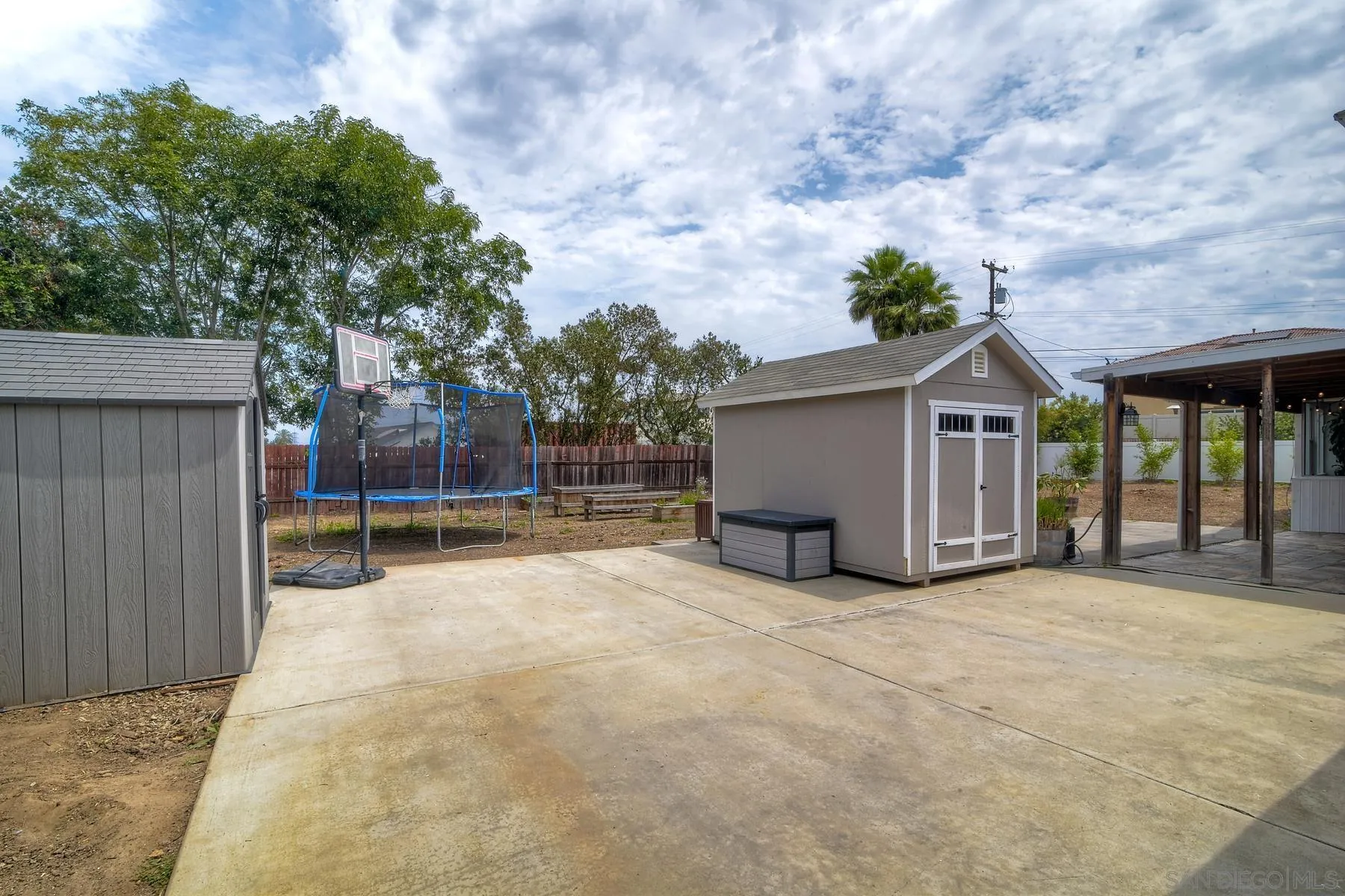 1451 Ridge Road Vista, CA 92081 - Photo 21 of 31 a view of a house with wooden fence