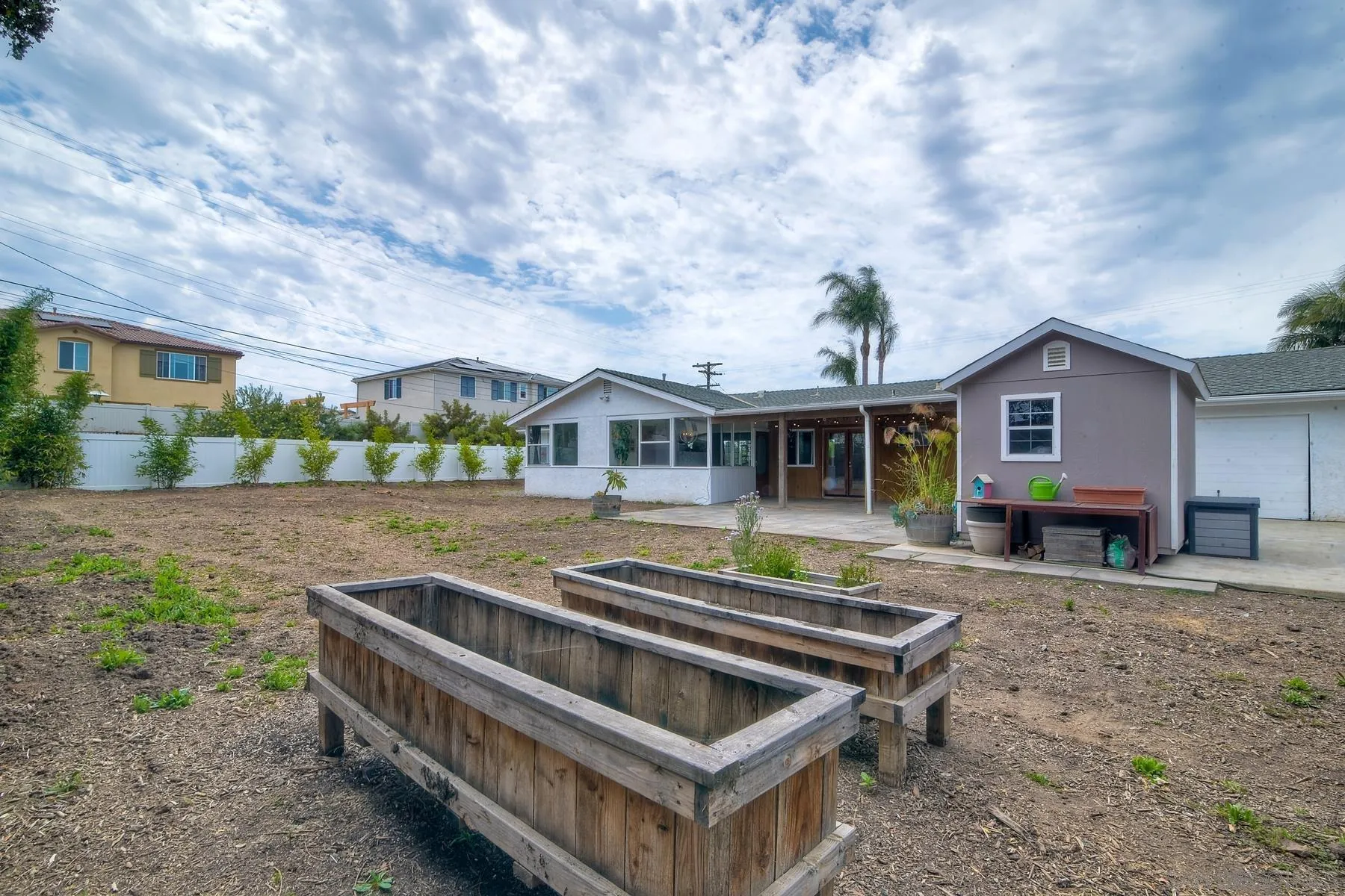 1451 Ridge Road Vista, CA 92081 - Photo 22 of 31 a view of house with yard outdoor seating and barbeque oven