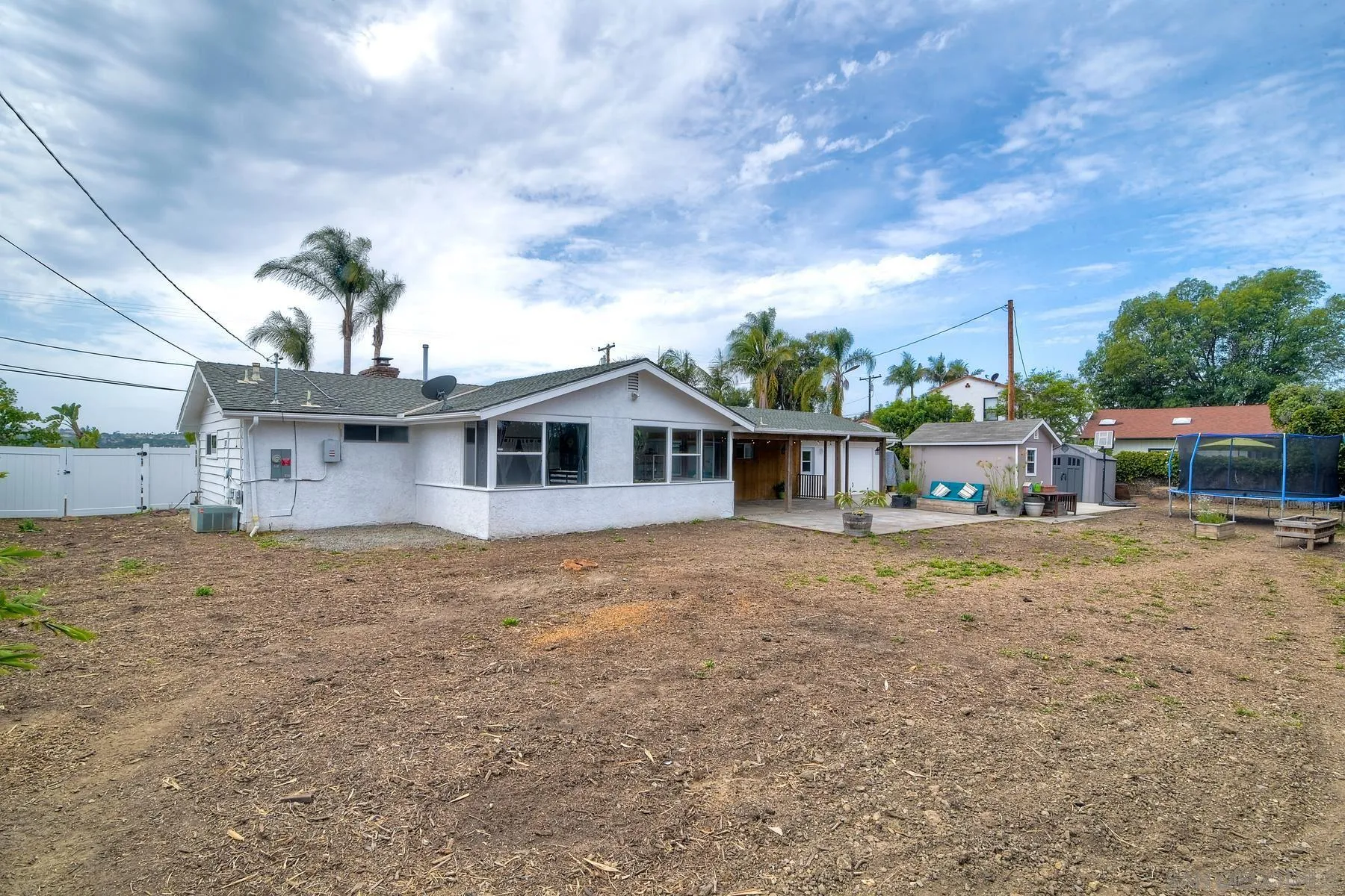 1451 Ridge Road Vista, CA 92081 - Photo 23 of 31 a front view of a house with a garden