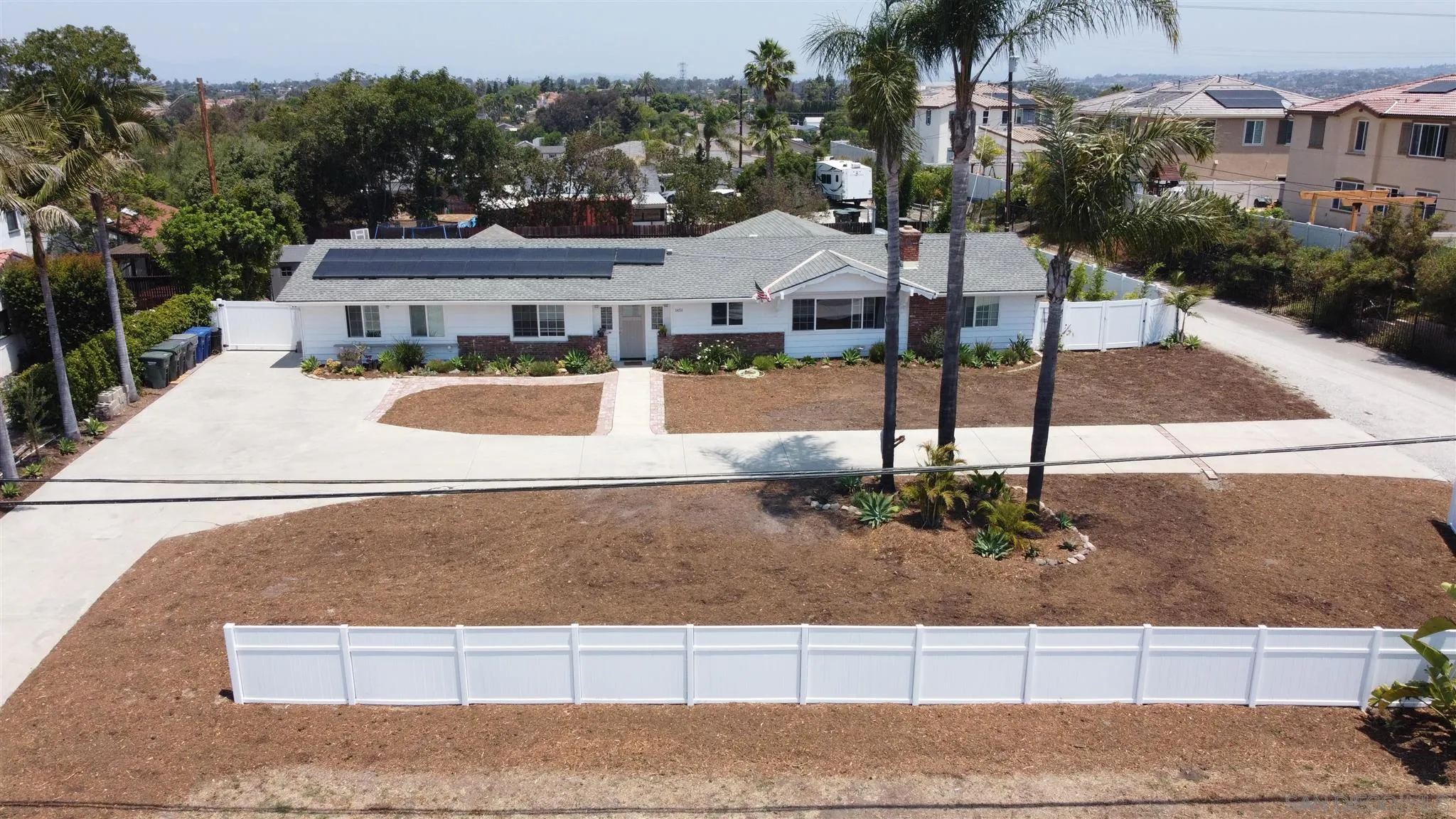 1451 Ridge Road Vista, CA 92081 - Photo 27 of 31 a front view of a house with garden