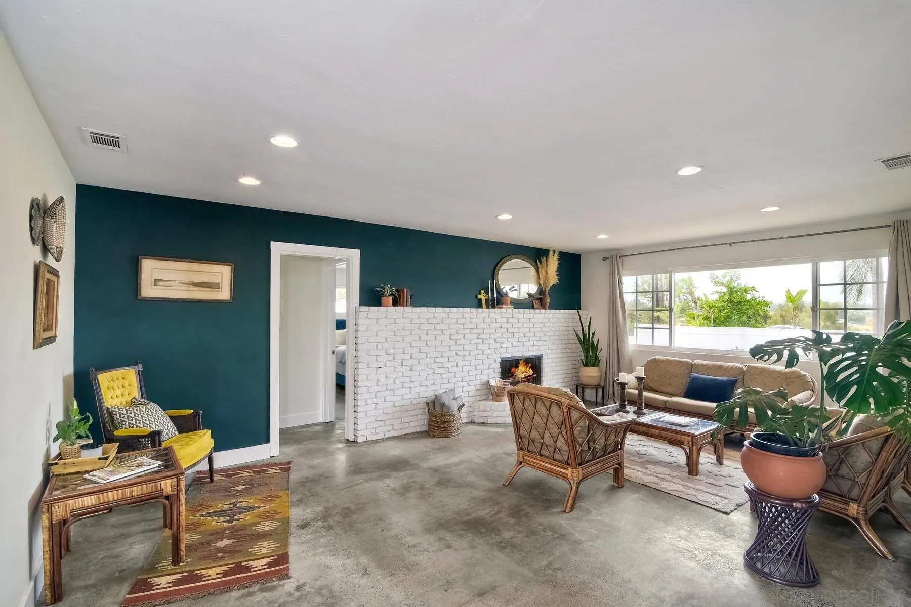 1451 Ridge Road Vista, CA 92081 - Photo 10 of 31 a living room with furniture and a large window