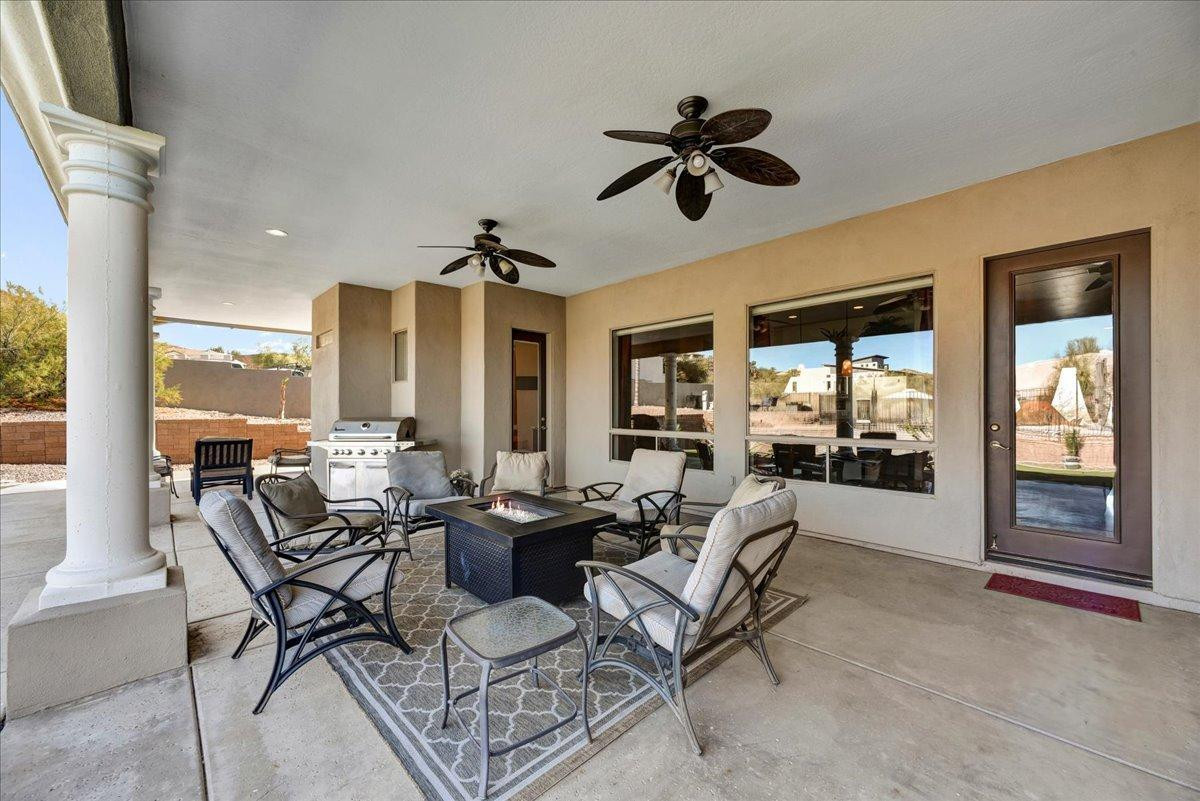 412 East Yearling Road Phoenix, AZ 85085 - Photo 33 of 51 a living room with furniture and a large window