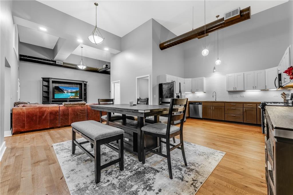 10 Walnut Street, Unit 7 Pittsburgh, PA 15202 - Photo 12 of 49 a large kitchen with a table and chairs in it