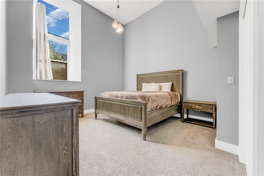 10 Walnut Street, Unit 7 Pittsburgh, PA 15202 - Photo 16 of 49 a bedroom with a bed and a window