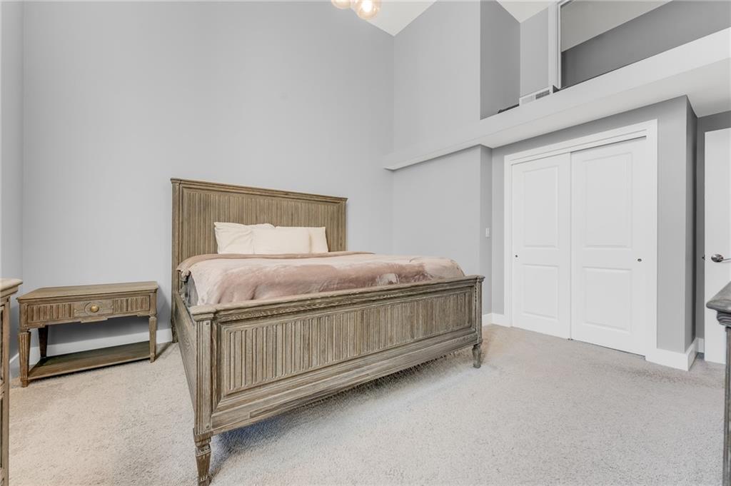 10 Walnut Street, Unit 7 Pittsburgh, PA 15202 - Photo 17 of 49 a bedroom with a bed and a cabinets