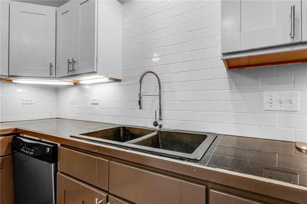 10 Walnut Street, Unit 7 Pittsburgh, PA 15202 - Photo 4 of 49 a close view of sink and tap