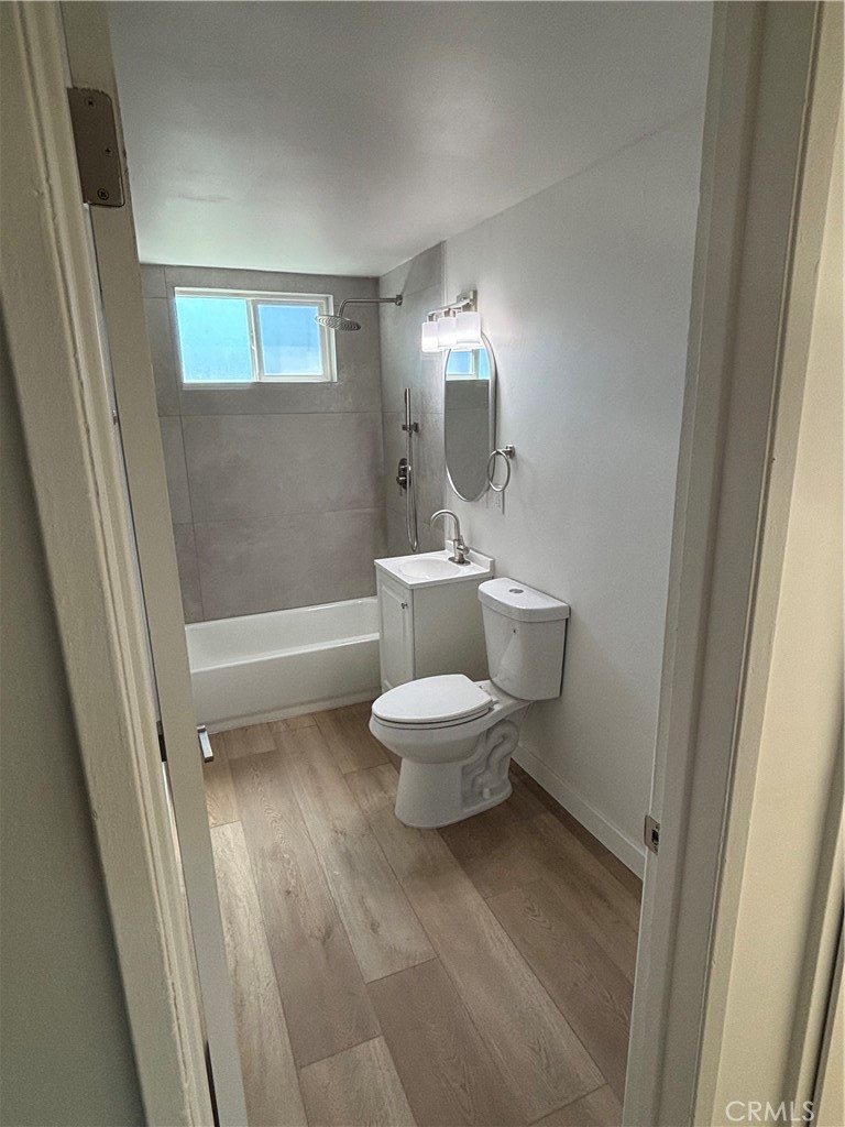 1608 Alviso Street Simi Valley, CA 93065 - Photo 2 of 13 a bathroom with a toilet and a shower