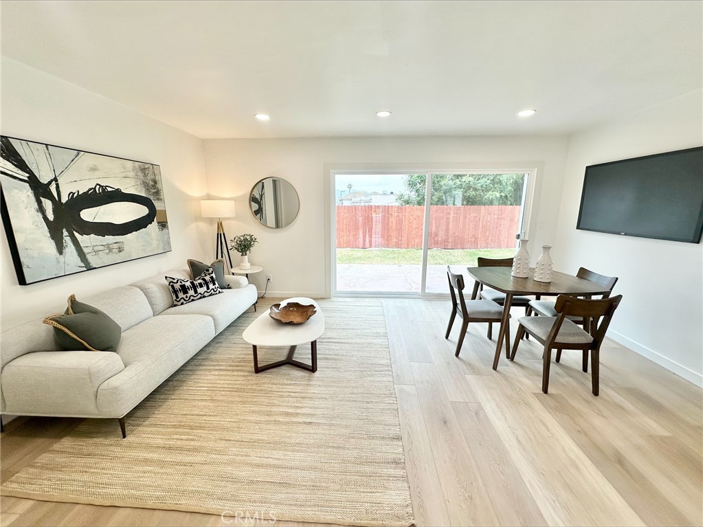 1608 Alviso Street Simi Valley, CA 93065 - Photo 10 of 13 a living room with furniture and a flat screen tv