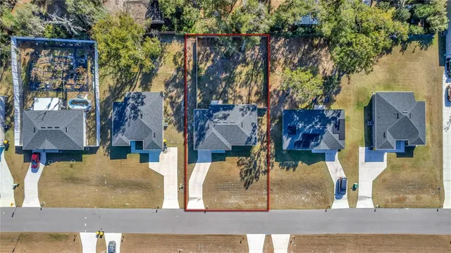 front view of a house and a yard