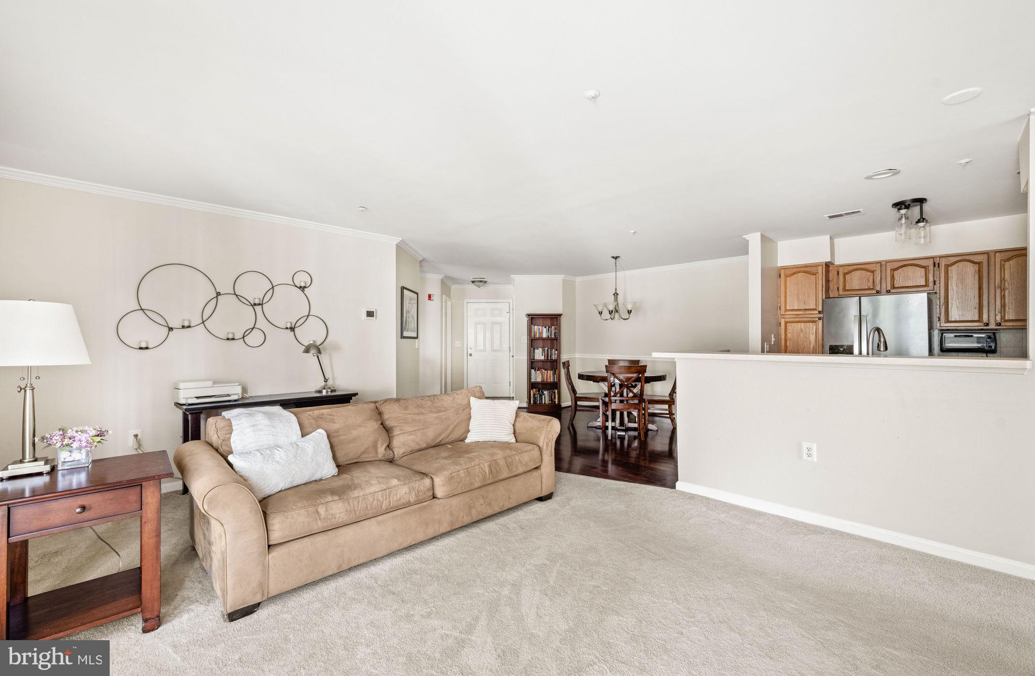 6602 Thackwell Way, Unit C Alexandria, VA 22315 - Photo 15 of 54 a living room with furniture and a couch