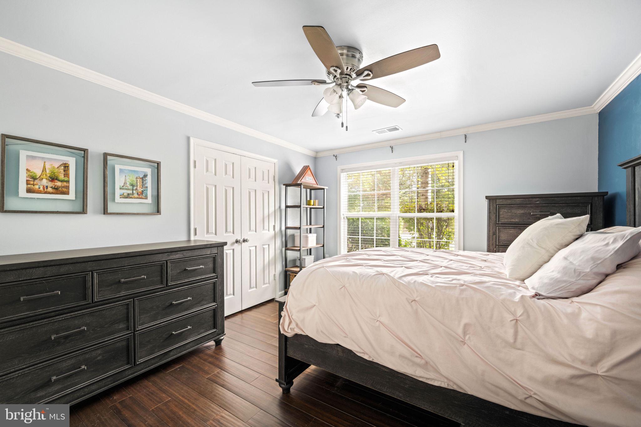 6602 Thackwell Way, Unit C Alexandria, VA 22315 - Photo 31 of 54 a bedroom with a bed and window