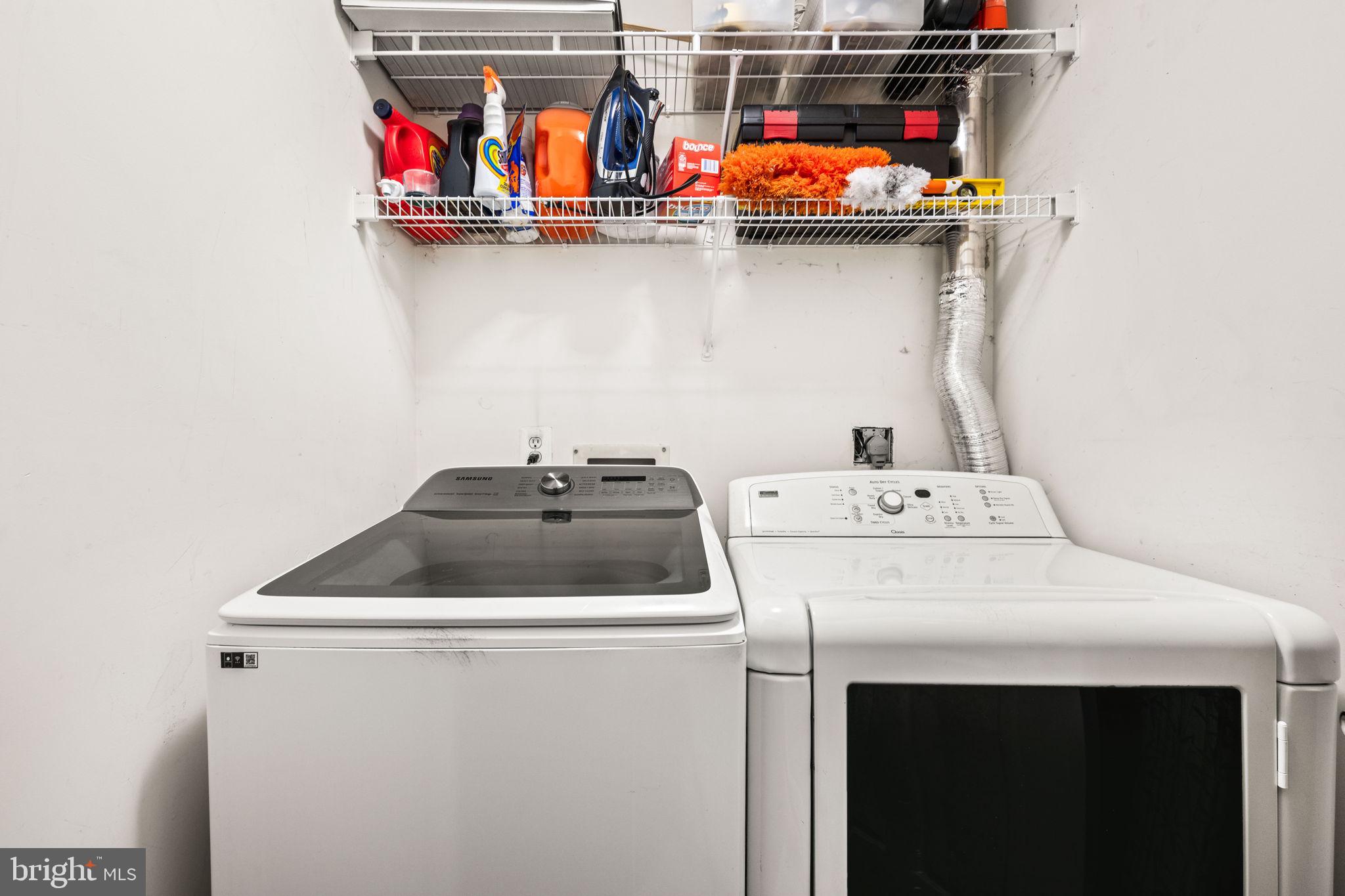 6602 Thackwell Way, Unit C Alexandria, VA 22315 - Photo 35 of 54 a utility room with dryer and washer