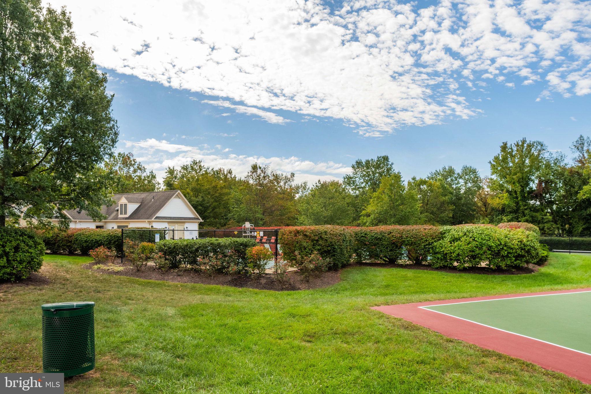 6602 Thackwell Way, Unit C Alexandria, VA 22315 - Photo 47 of 54 a view of a garden with lawn chairs