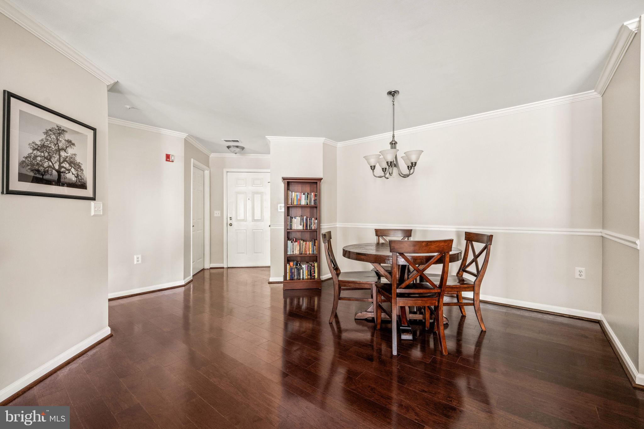 6602 Thackwell Way, Unit C Alexandria, VA 22315 - Photo 5 of 54 a view of a dining room with furniture and wooden floor