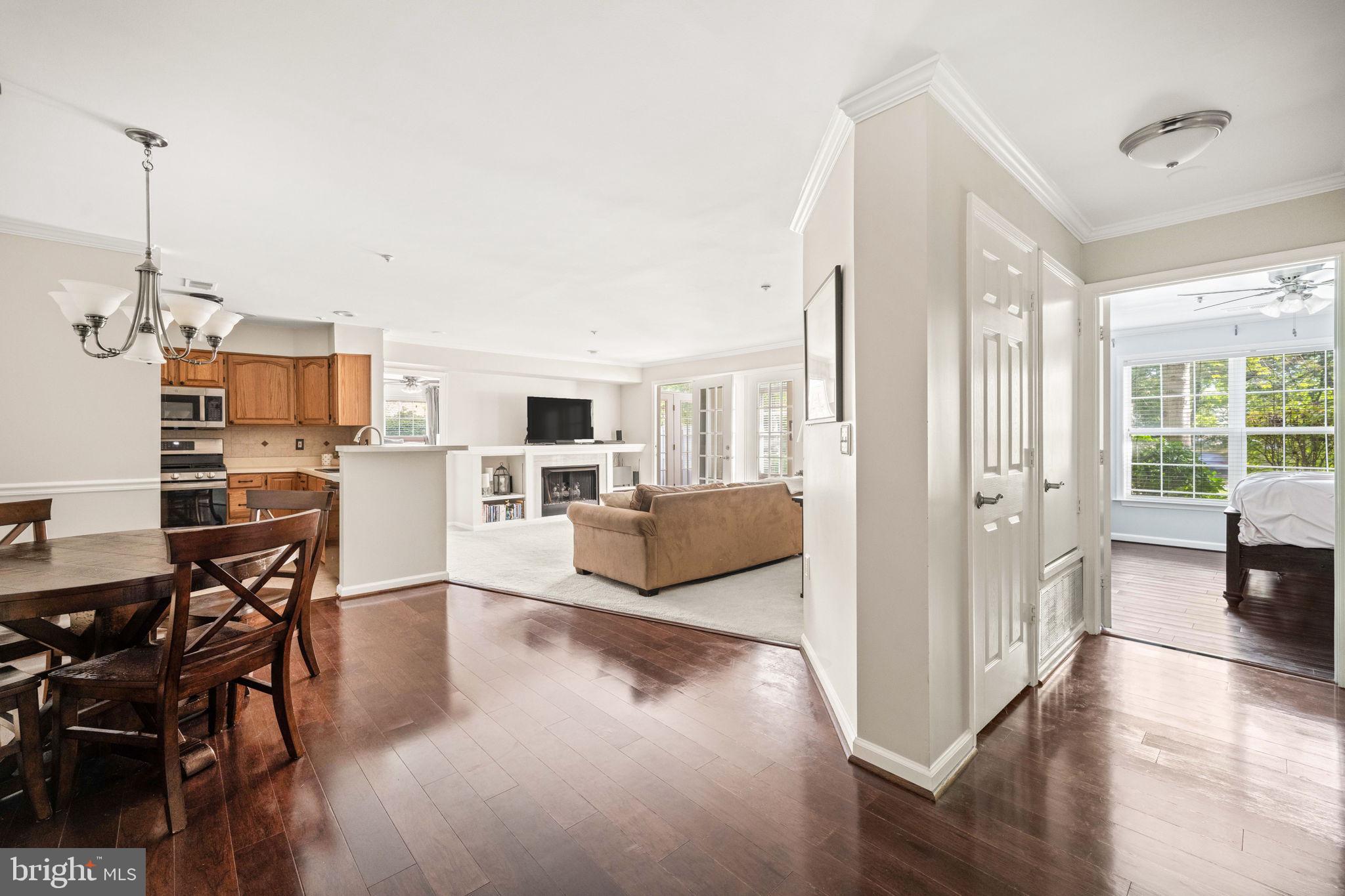 6602 Thackwell Way, Unit C Alexandria, VA 22315 - Photo 8 of 54 a living room with furniture and a table