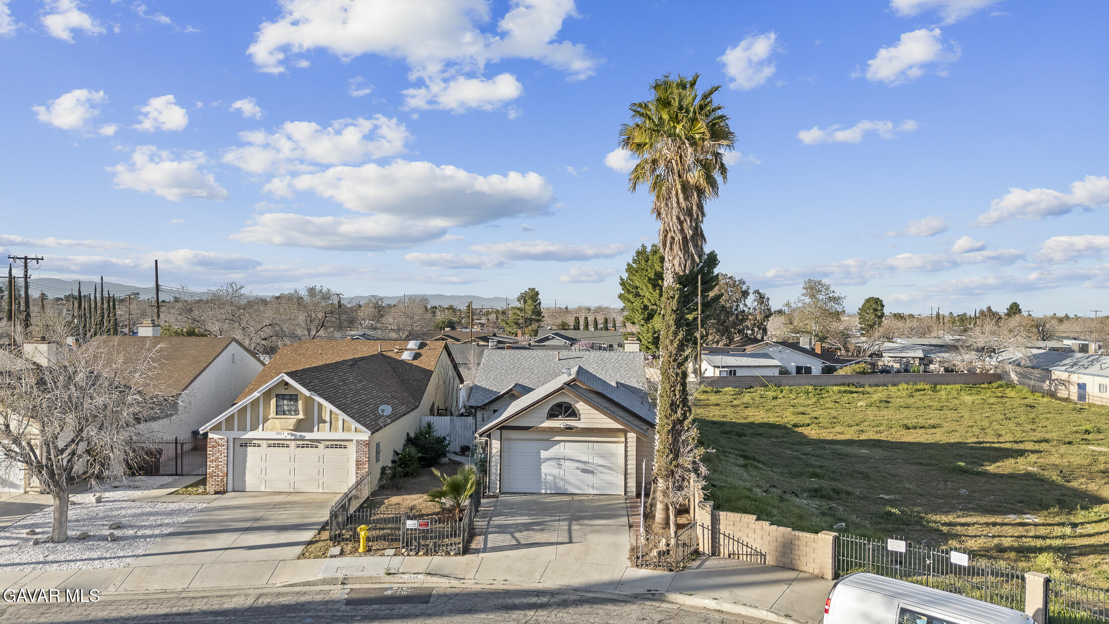 a view of a house with a ocean view