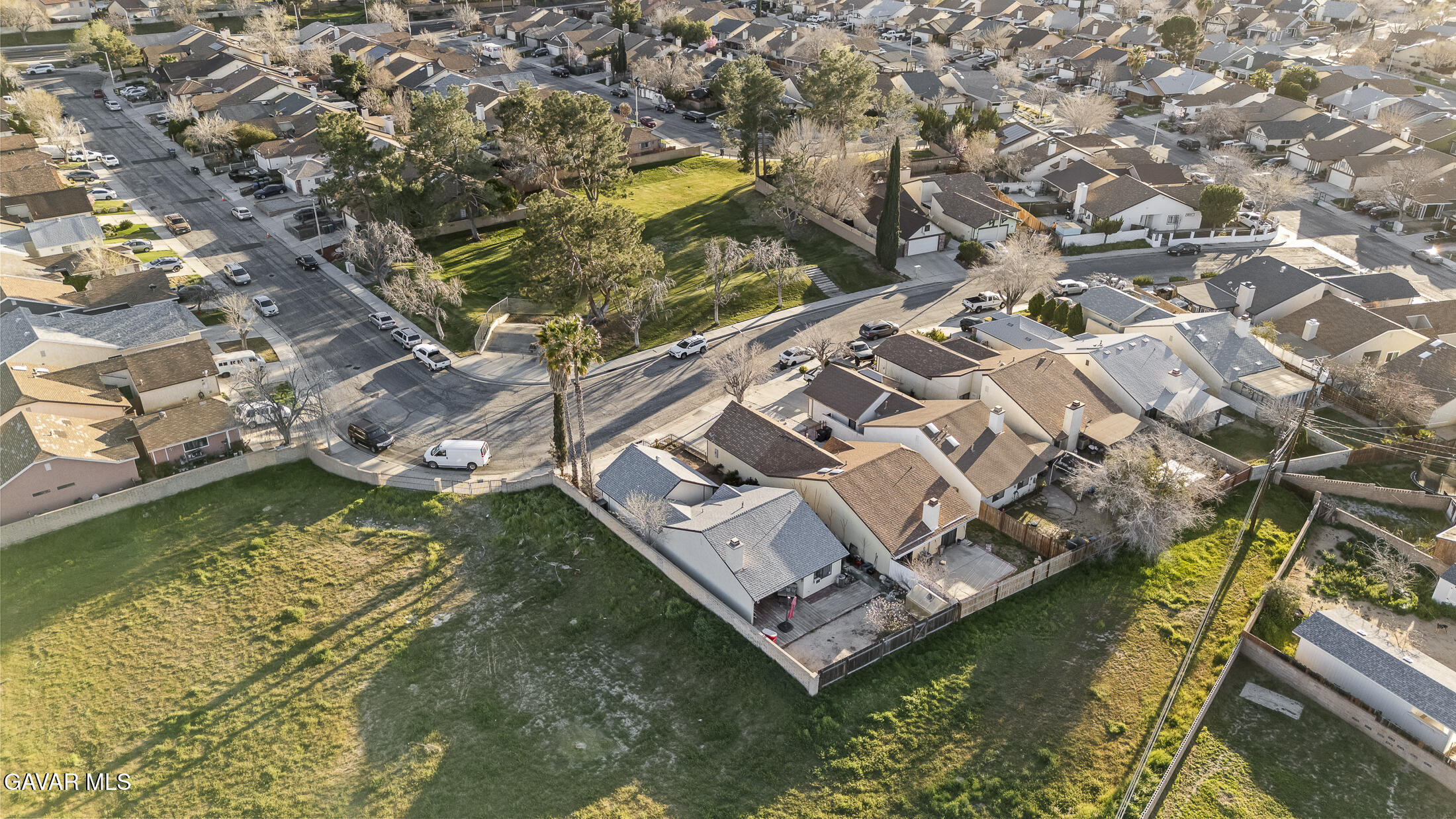 1535 East Ave R 6 Palmdale, CA 93550 - Photo 21 of 23 an aerial view of a house with a yard