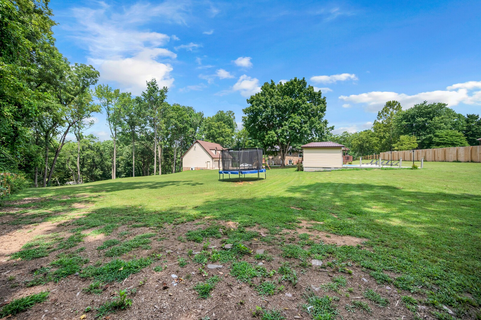 1057 Vanderbilt Road Mount Juliet, TN 37122 - Photo 18 of 39 a view of a house with a yard