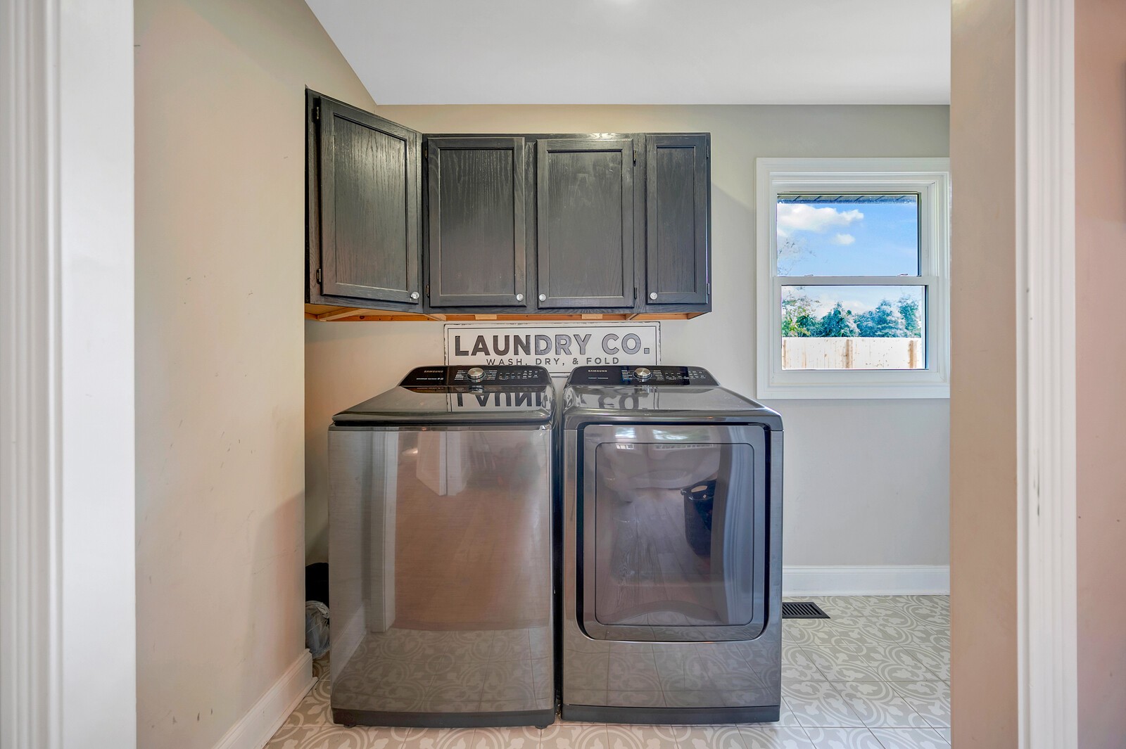 1057 Vanderbilt Road Mount Juliet, TN 37122 - Photo 26 of 39 a utility room with wooden floor washer and dryer