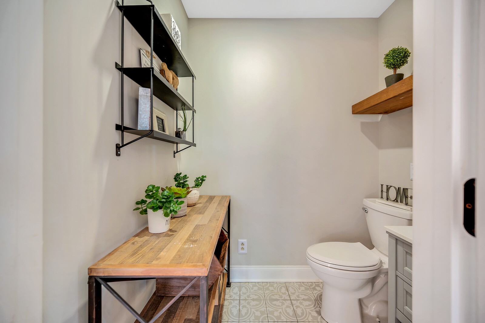 1057 Vanderbilt Road Mount Juliet, TN 37122 - Photo 29 of 39 a bathroom with a toilet sink and mirror