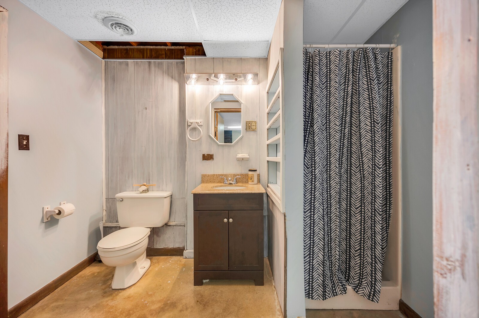 1057 Vanderbilt Road Mount Juliet, TN 37122 - Photo 35 of 39 a bathroom with a granite countertop sink toilet and shower