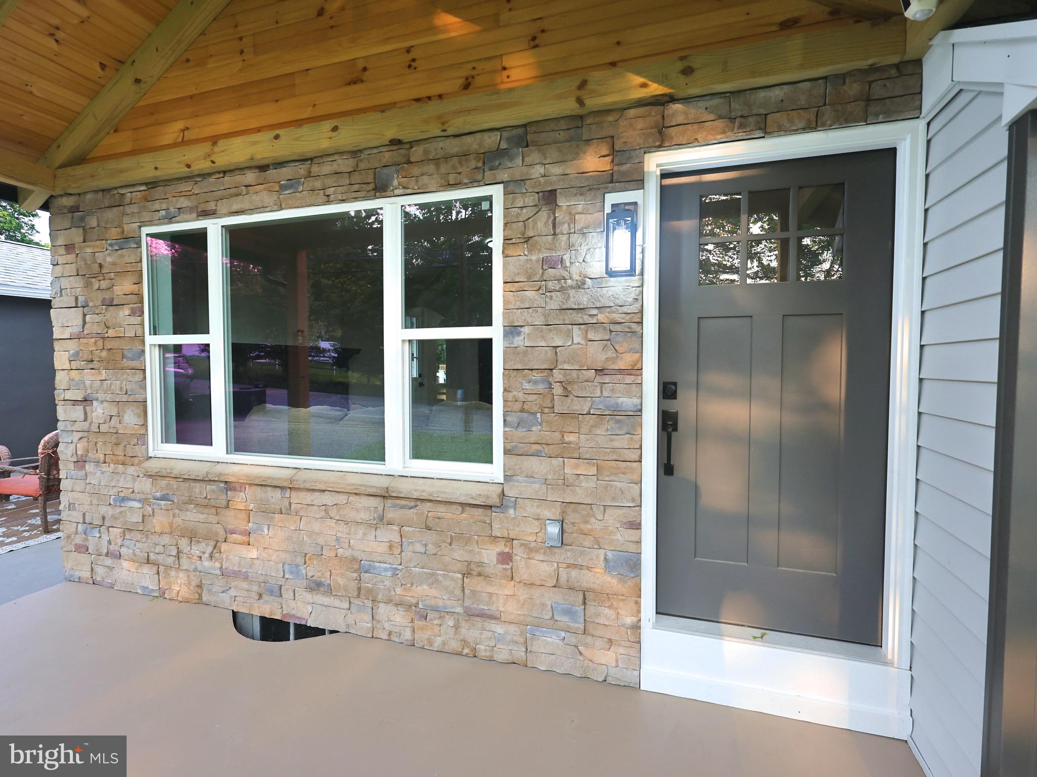 a front view of a house with shower
