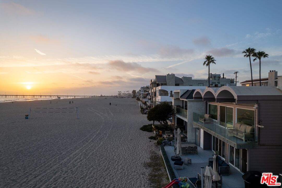 3806 Ocean Front Walk, Unit 2 Marina del Rey, CA 90292 - Photo 24 of 26 a view of a house with roof deck and seating space