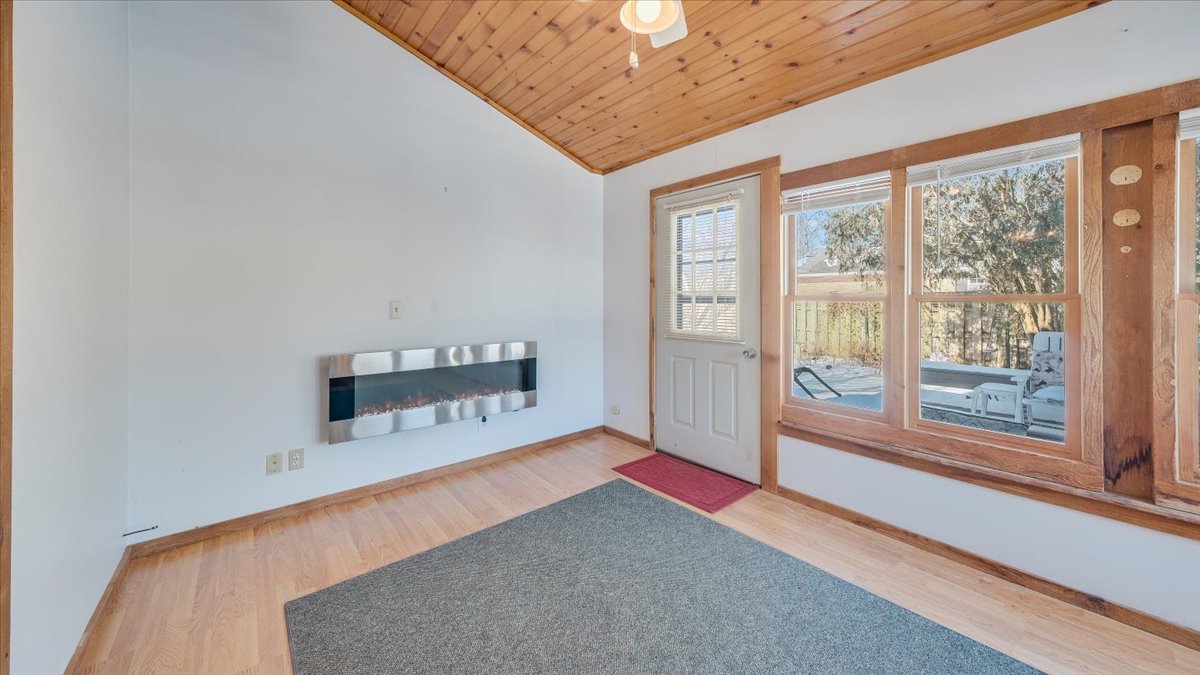 1504 Harrington Drive Champaign, IL 61821 - Photo 12 of 40 a living room with furniture and a large window