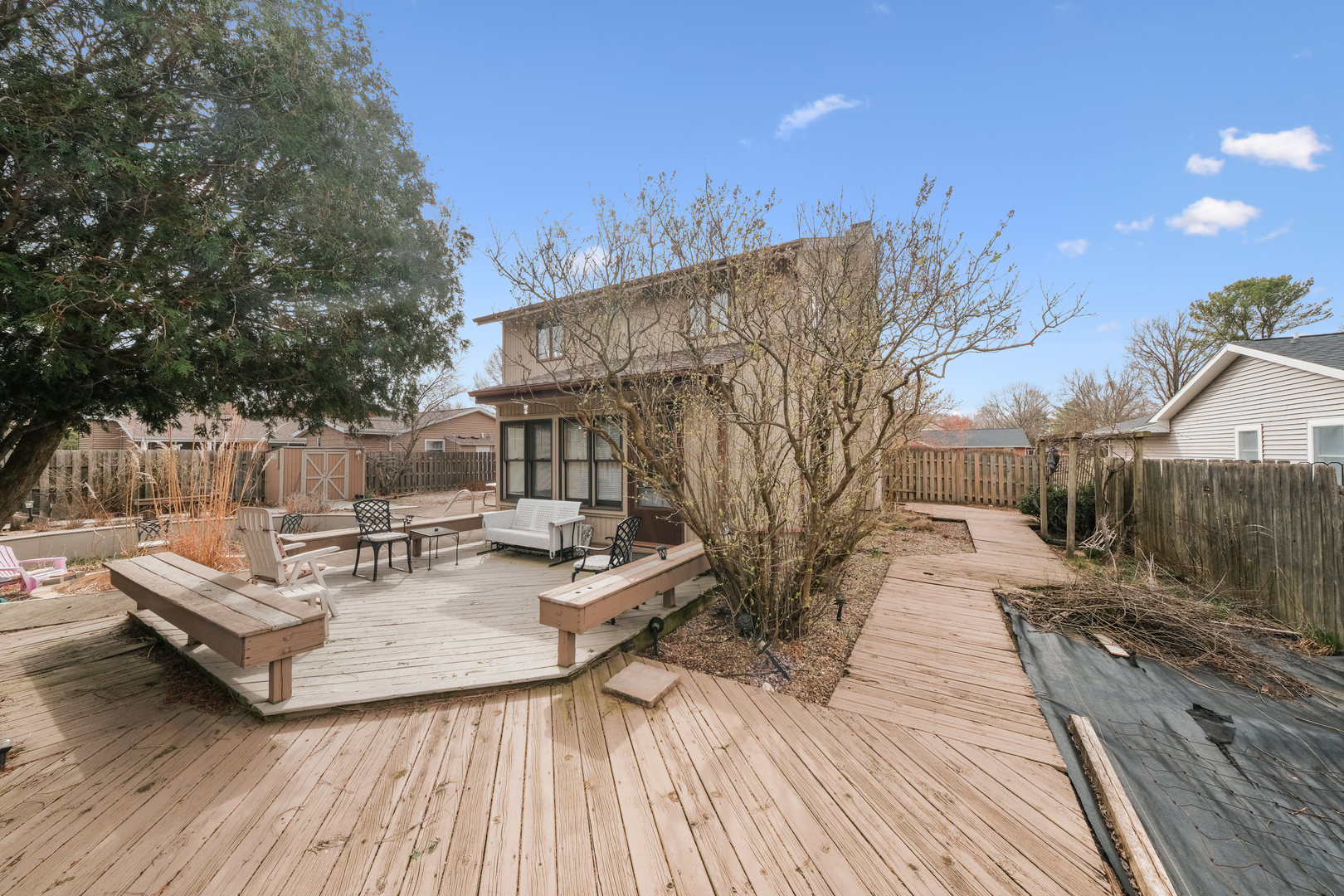 1504 Harrington Drive Champaign, IL 61821 - Photo 36 of 40 a view of house with patio outdoor seating and wooden floor