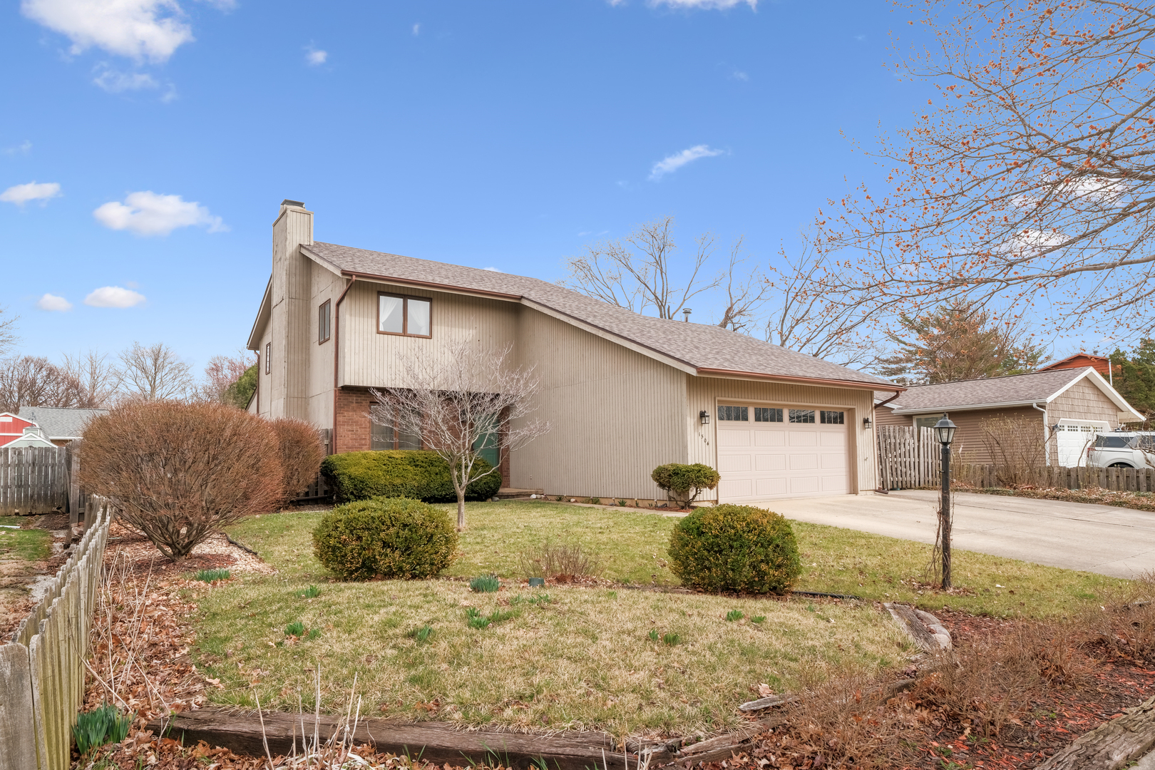1504 Harrington Drive Champaign, IL 61821 - Photo 40 of 40 a view of a house with a yard