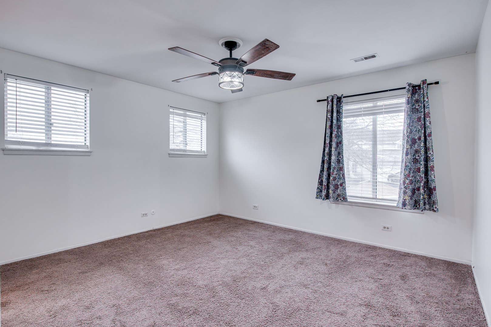 340 Springlake Lane, Unit D Aurora, IL 60504 - Photo 13 of 15 a view of an empty room with a window