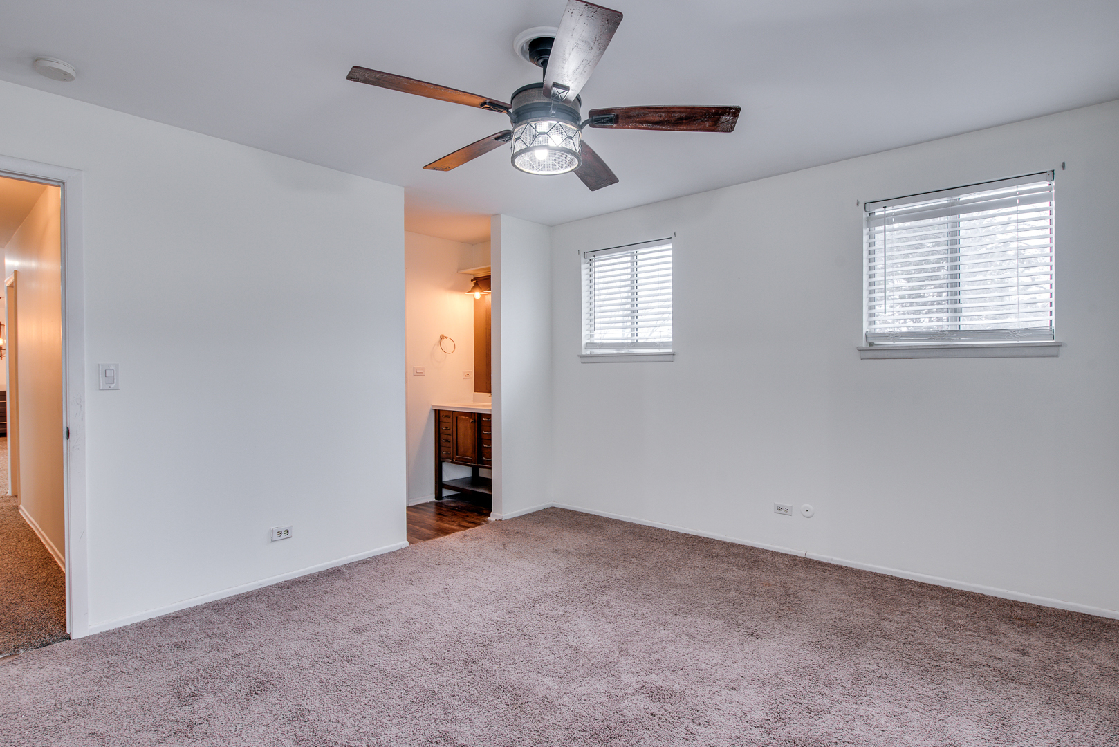 340 Springlake Lane, Unit D Aurora, IL 60504 - Photo 15 of 15 a view of an empty room with a window