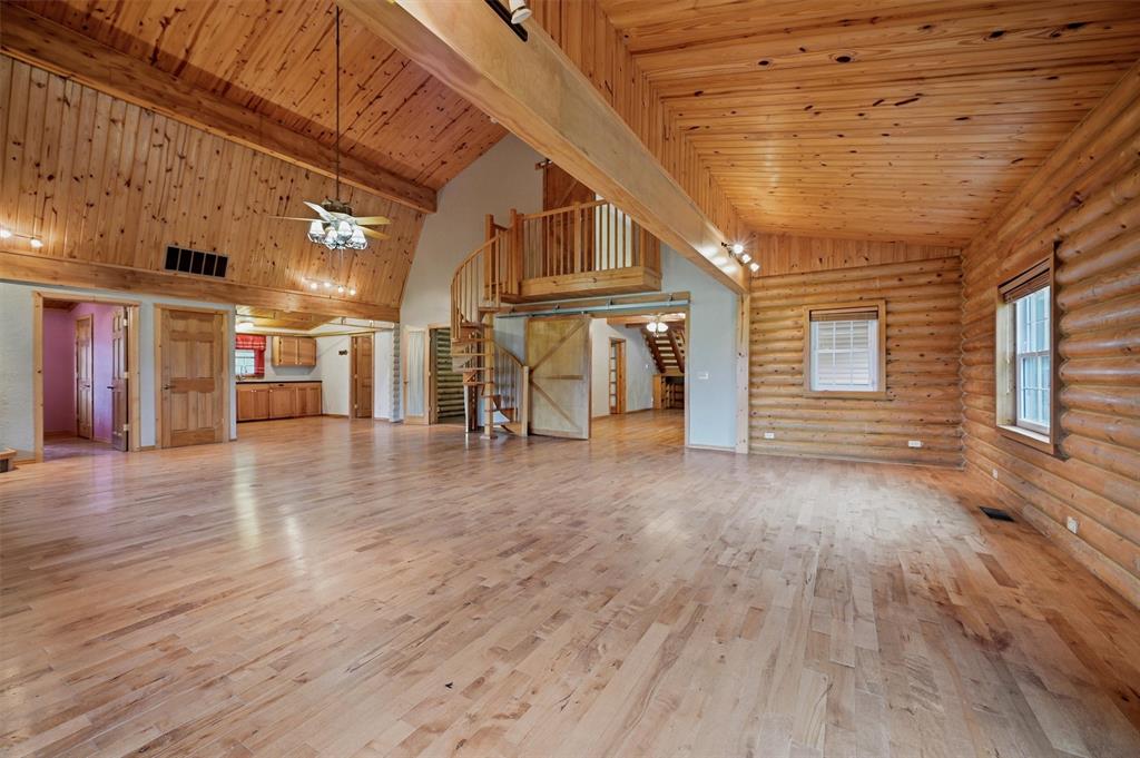 570 Ayres Road Bells, TX 75414 - Photo 10 of 40 a view of a porch with wooden floor